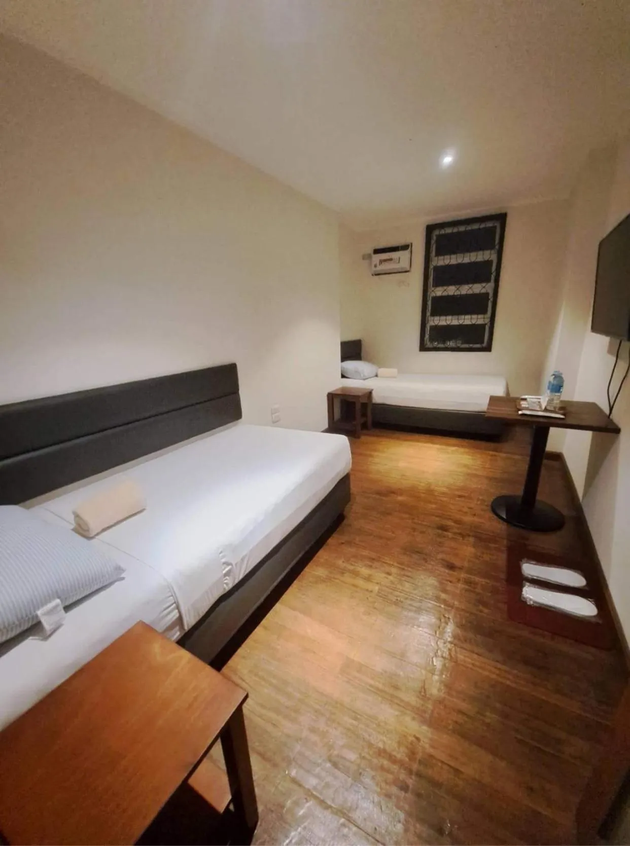 Bed in The Hub District Garden Suites