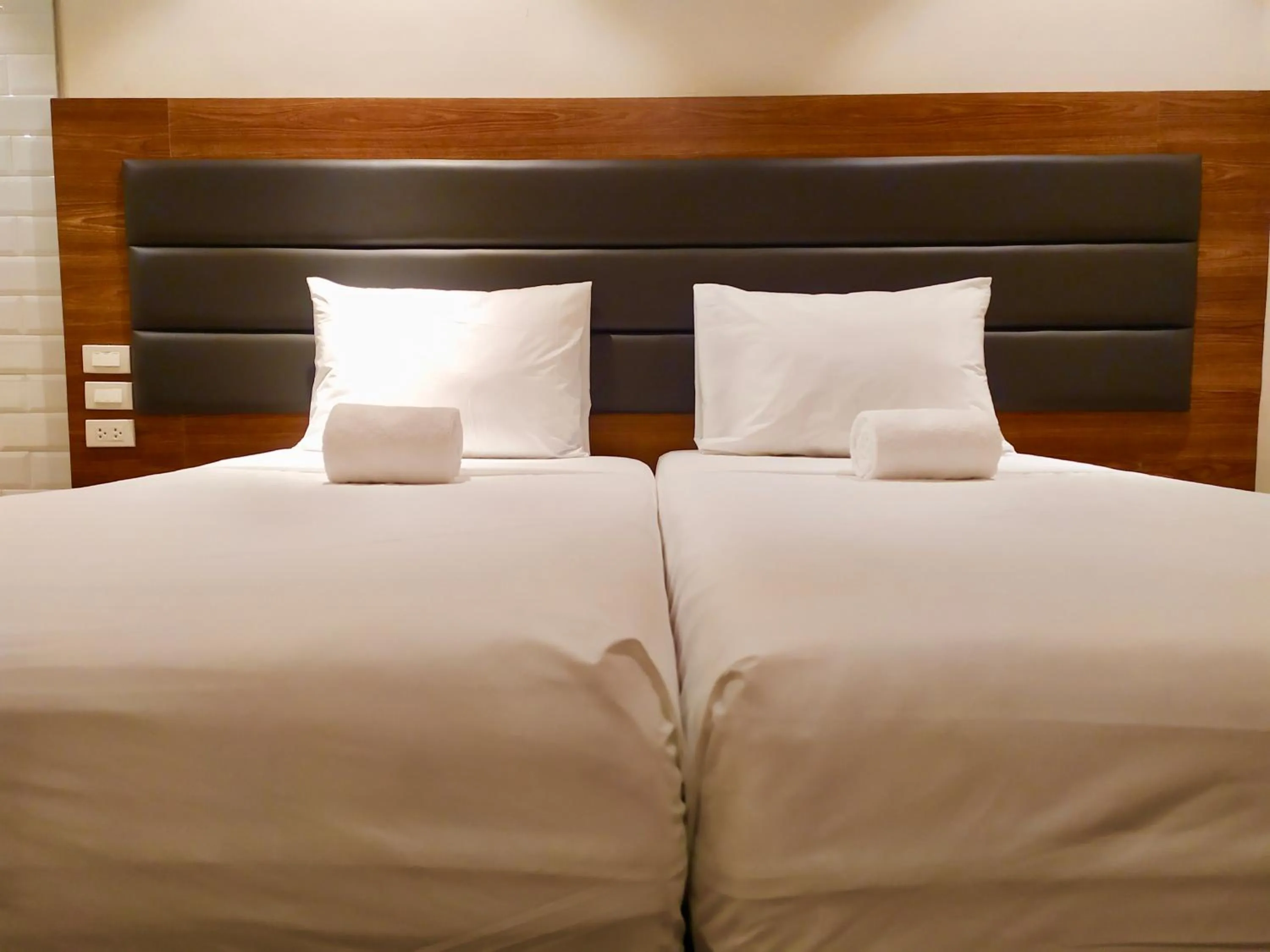 Bed in The Hub District Garden Suites