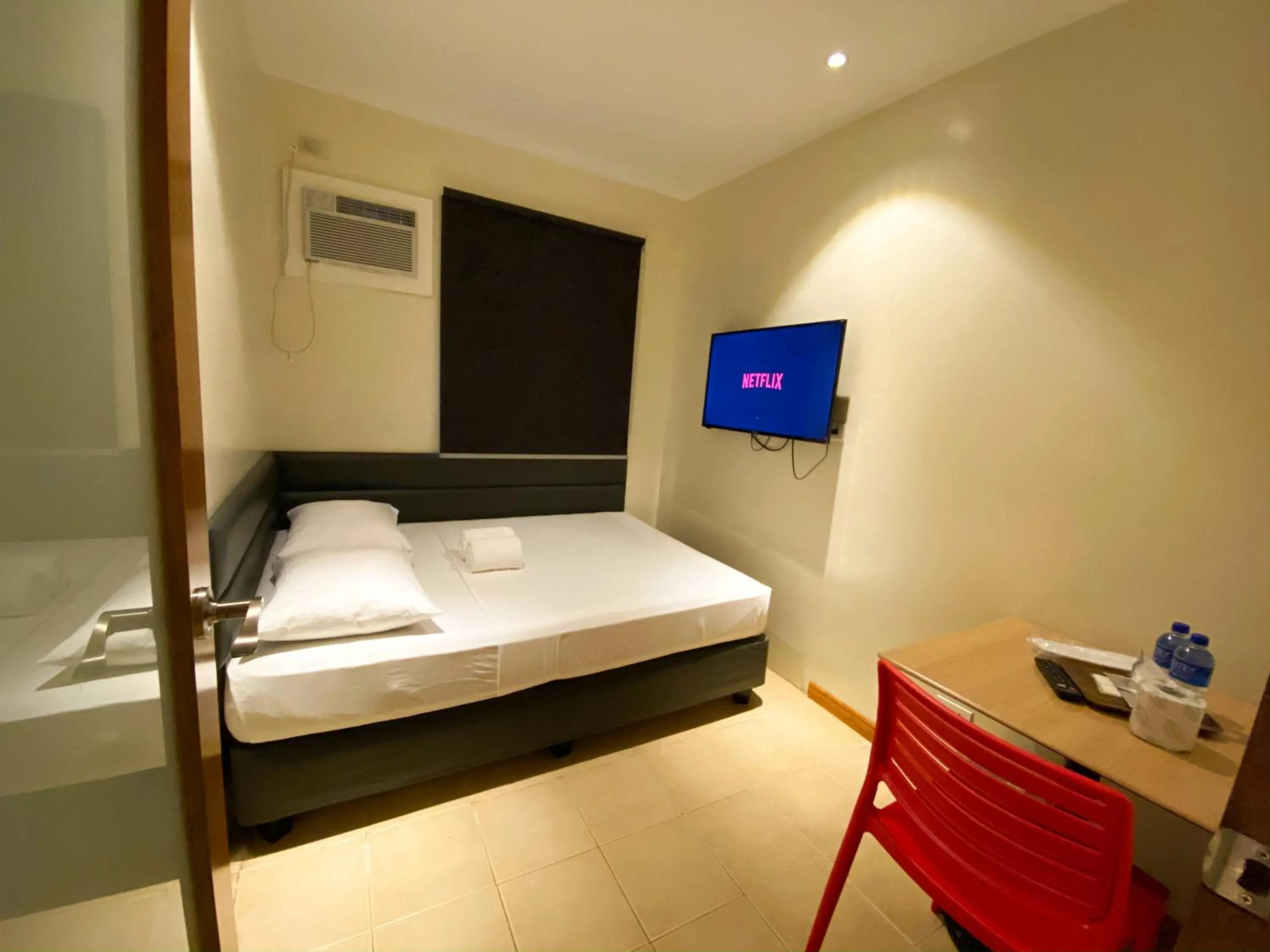 Bed in The Hub District Garden Suites