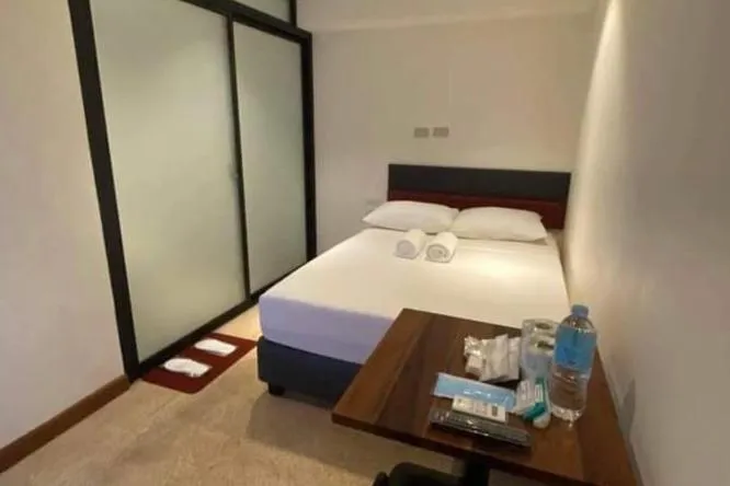 Bed in The Hub District Garden Suites