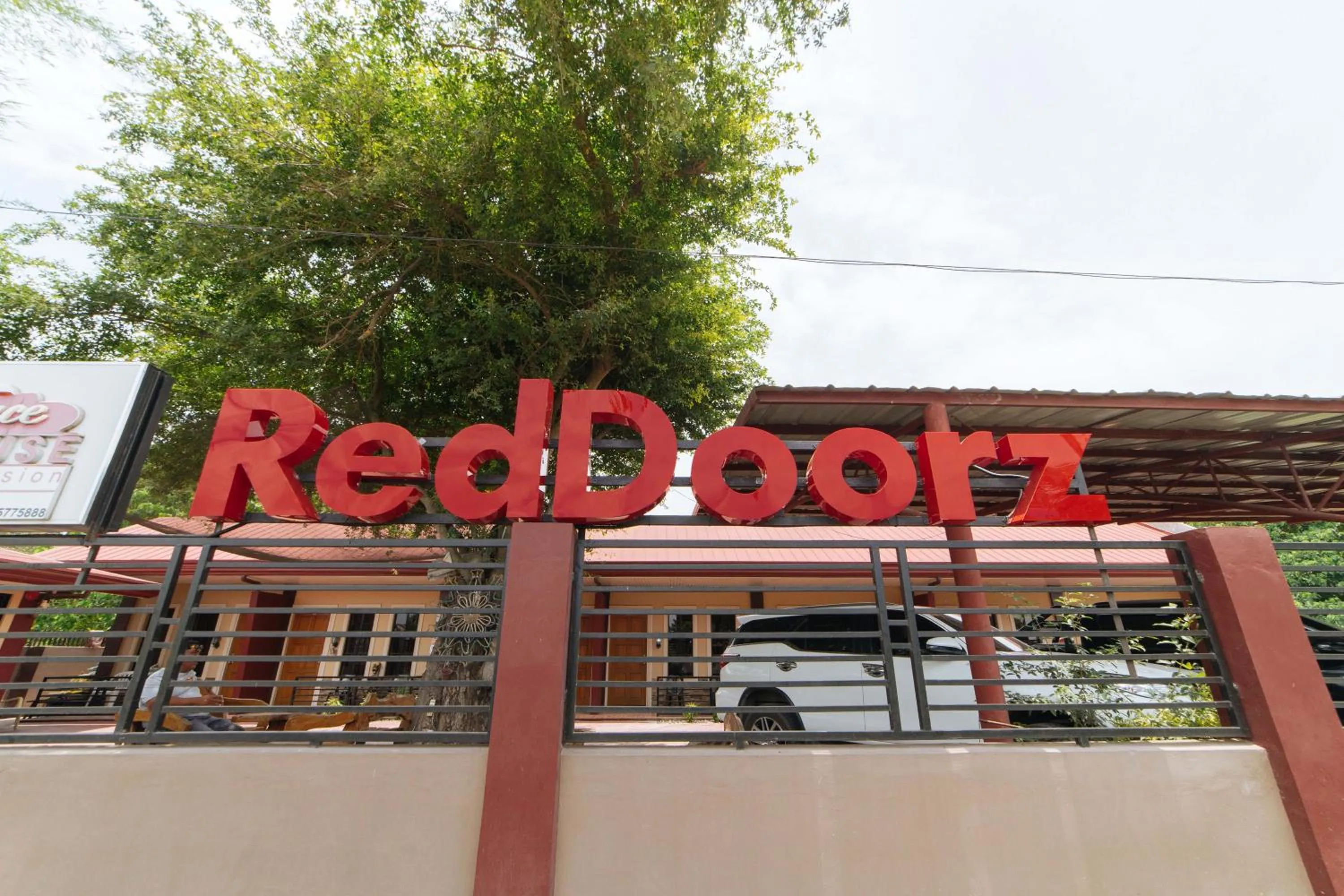 Property logo or sign in RedDoorz @ Lagao General Santos