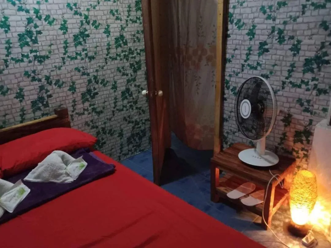 Bed in SHUKRAN Apartelle