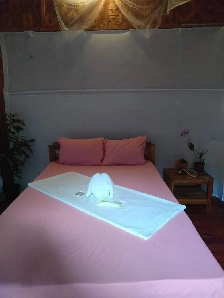 Bed in SHUKRAN Apartelle