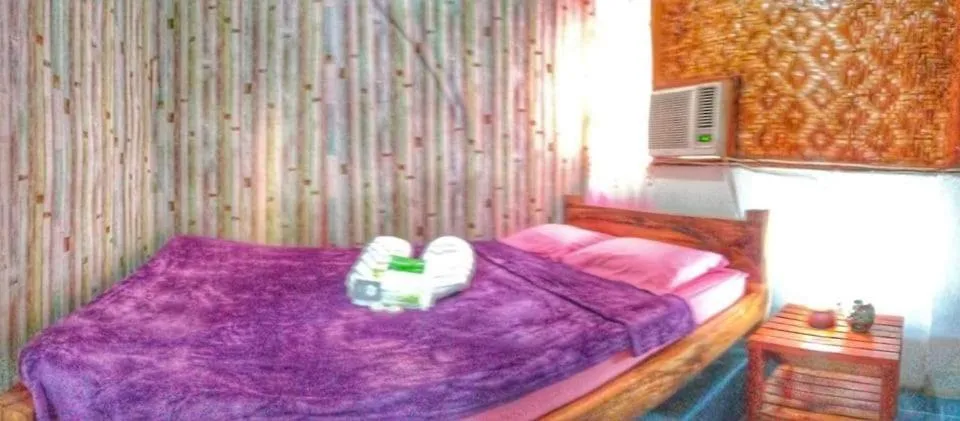 Bed in SHUKRAN Apartelle