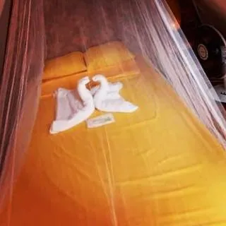 Bedroom, Bed in SHUKRAN Apartelle