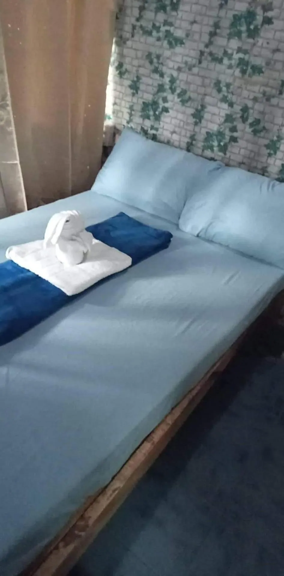 Bed in SHUKRAN Apartelle