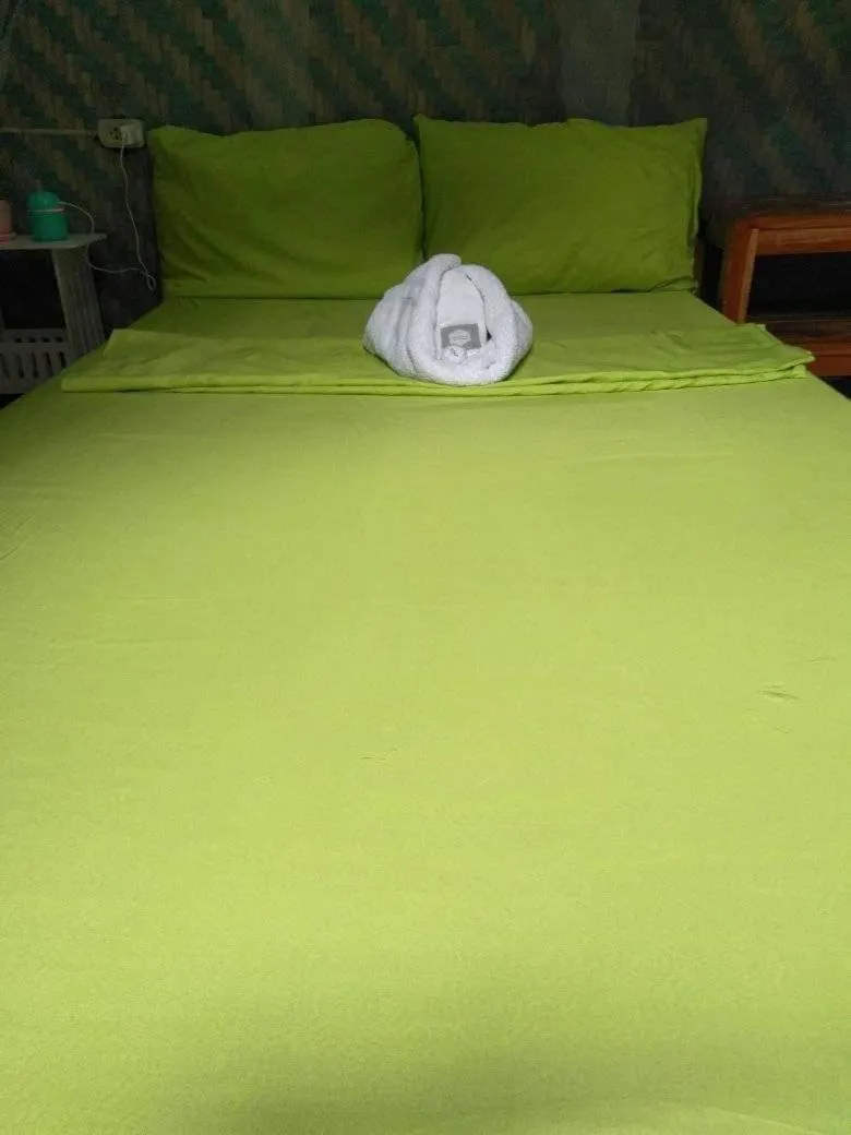 Bed in SHUKRAN Apartelle