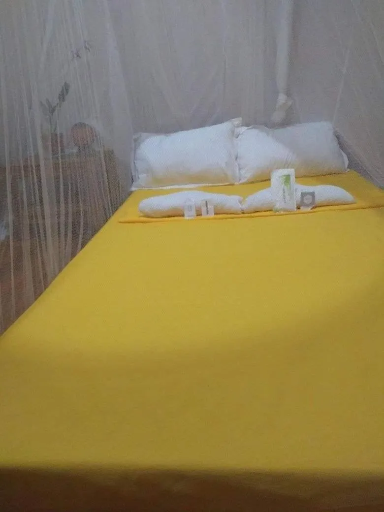 Bed in SHUKRAN Apartelle