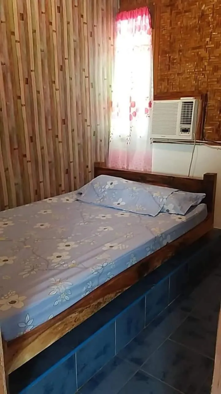 Bed in SHUKRAN Apartelle