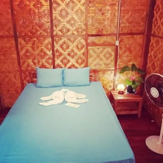 Bed in SHUKRAN Apartelle