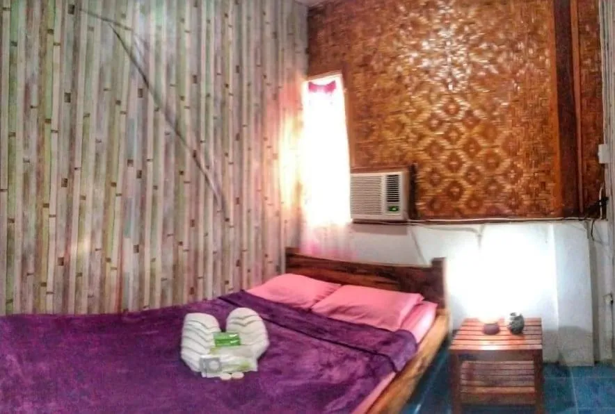 Bed in SHUKRAN Apartelle