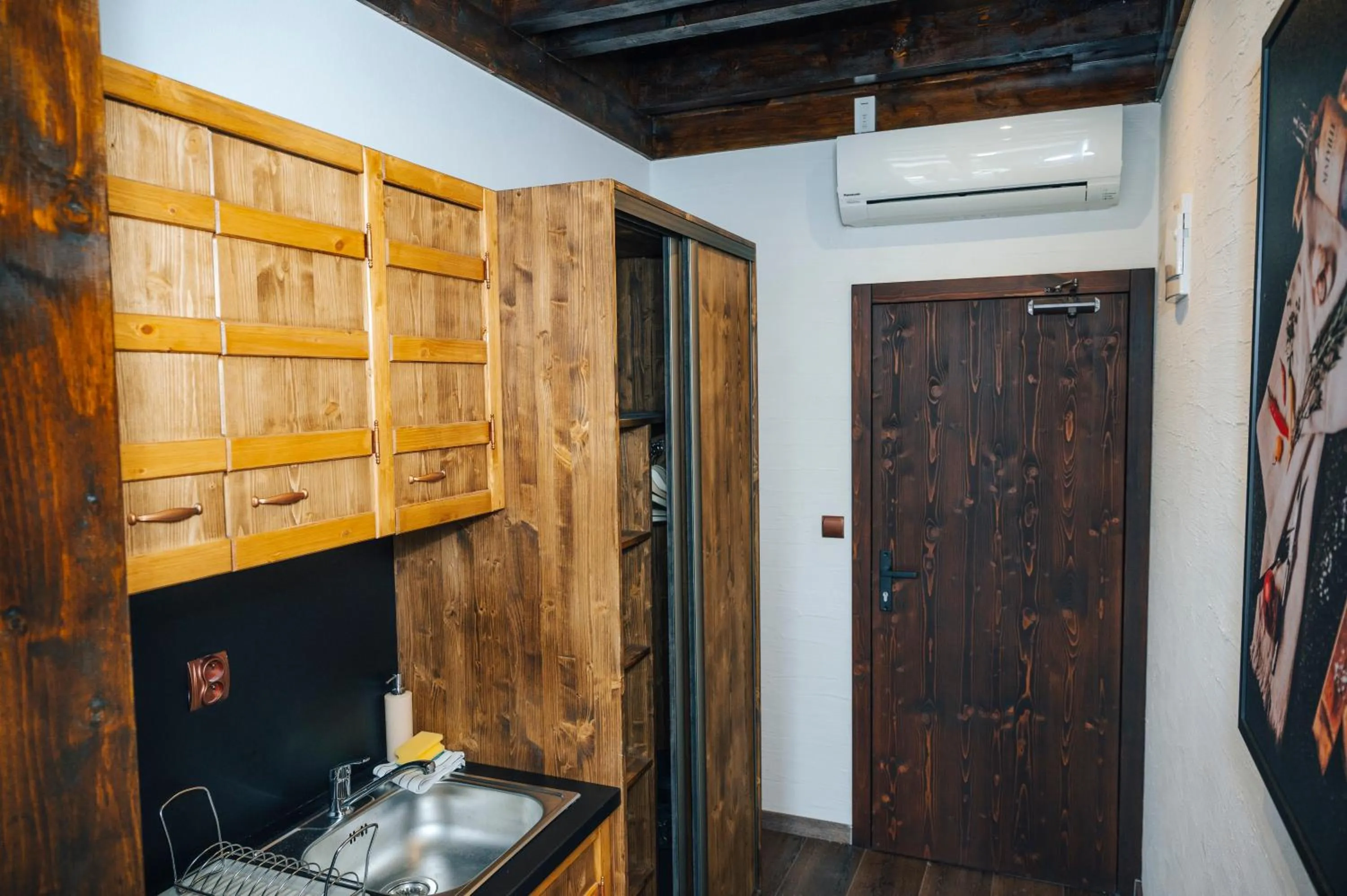 Kitchen or kitchenette in Nestville Apartments