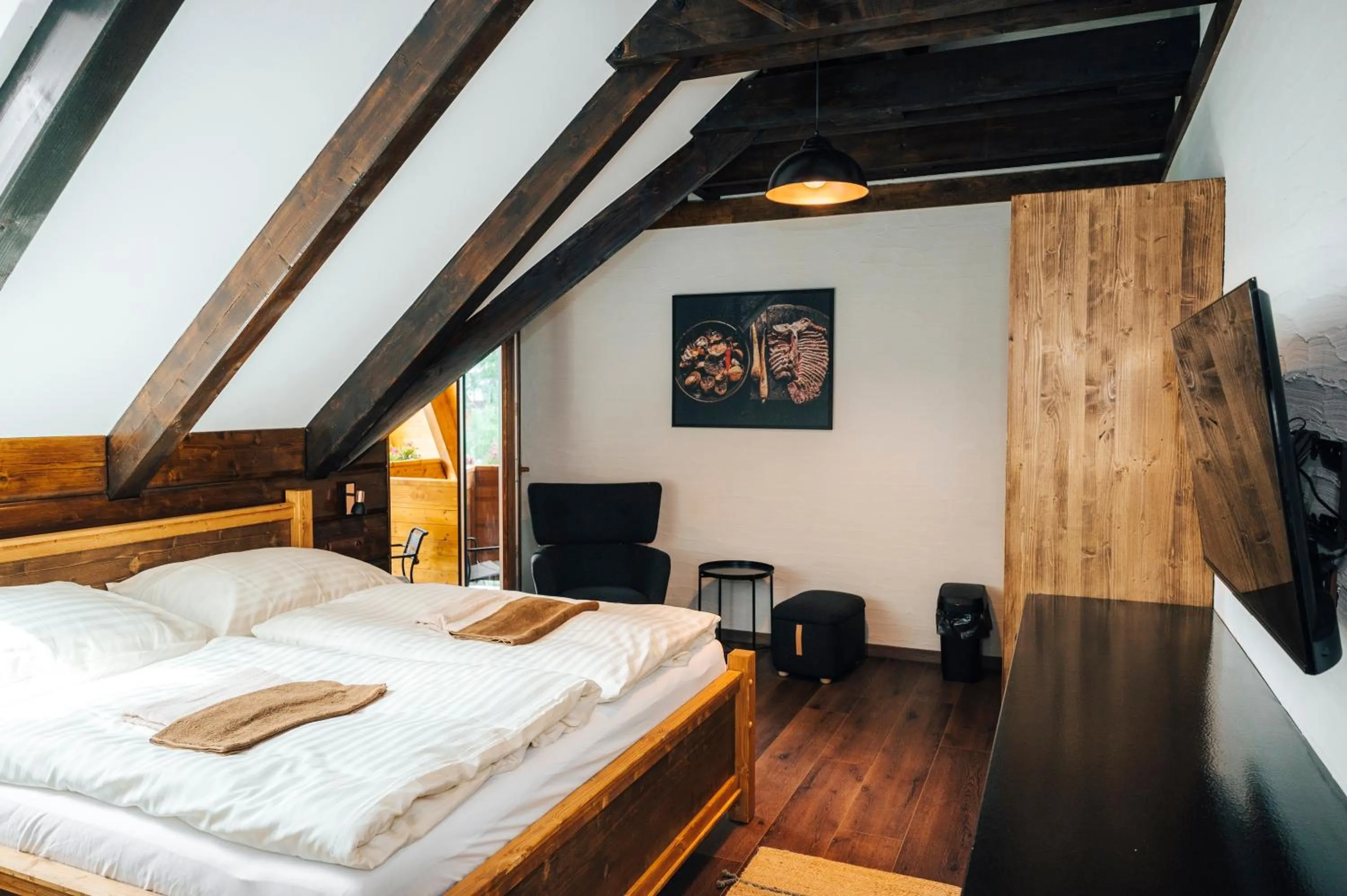 Bed in Nestville Apartments