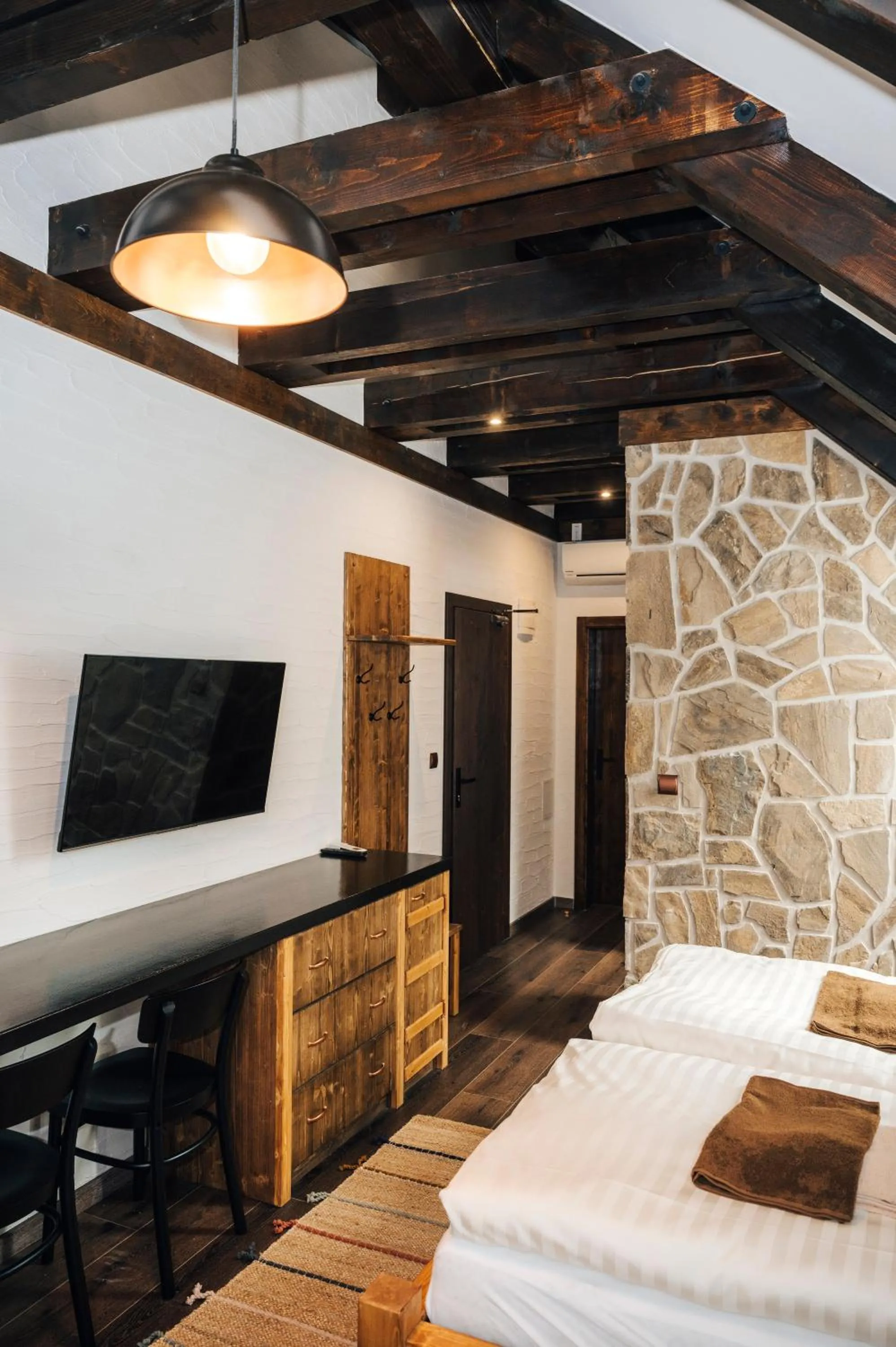 TV and multimedia, Bed in Nestville Apartments