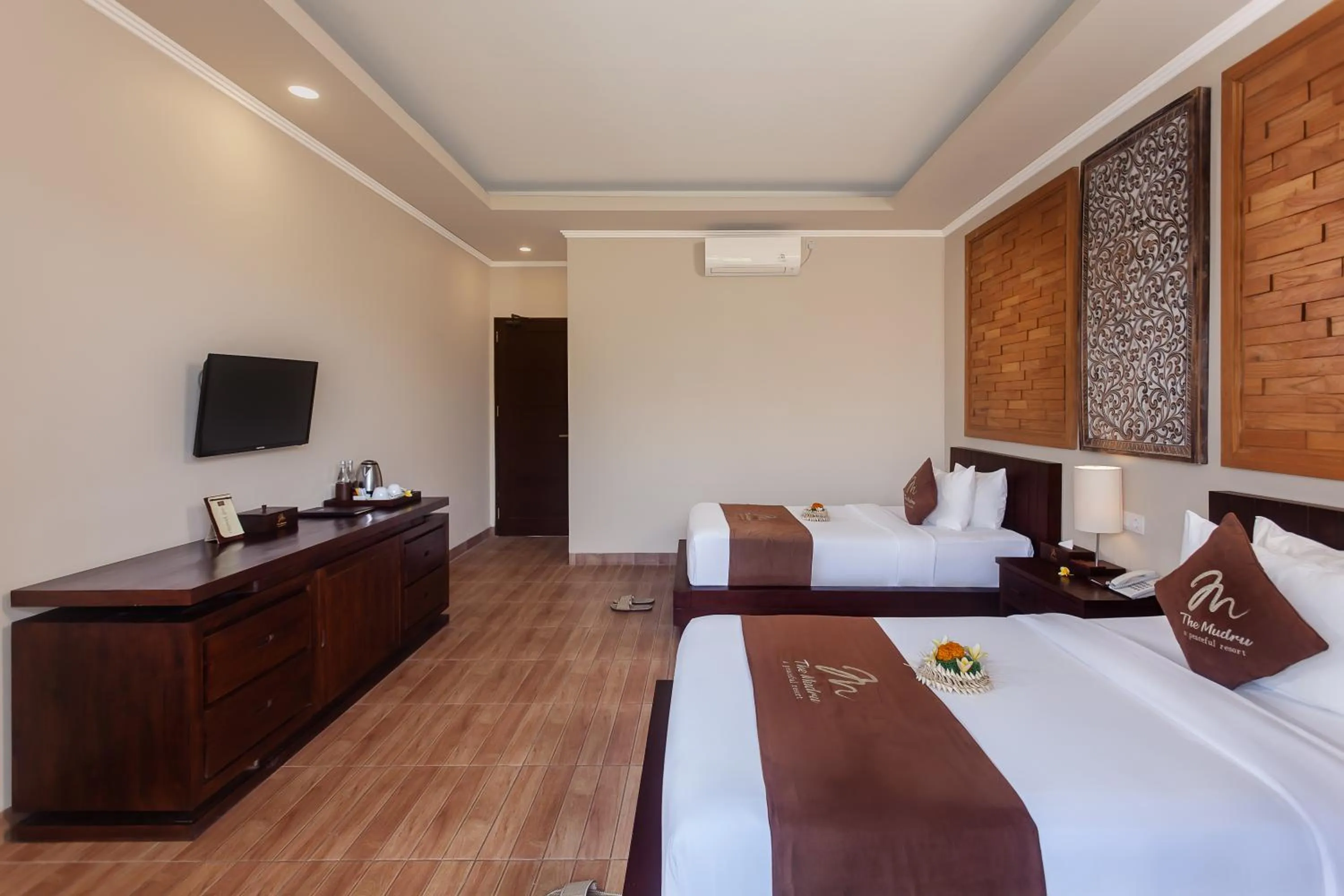 Bed in The Mudru Resort by GenuineHost