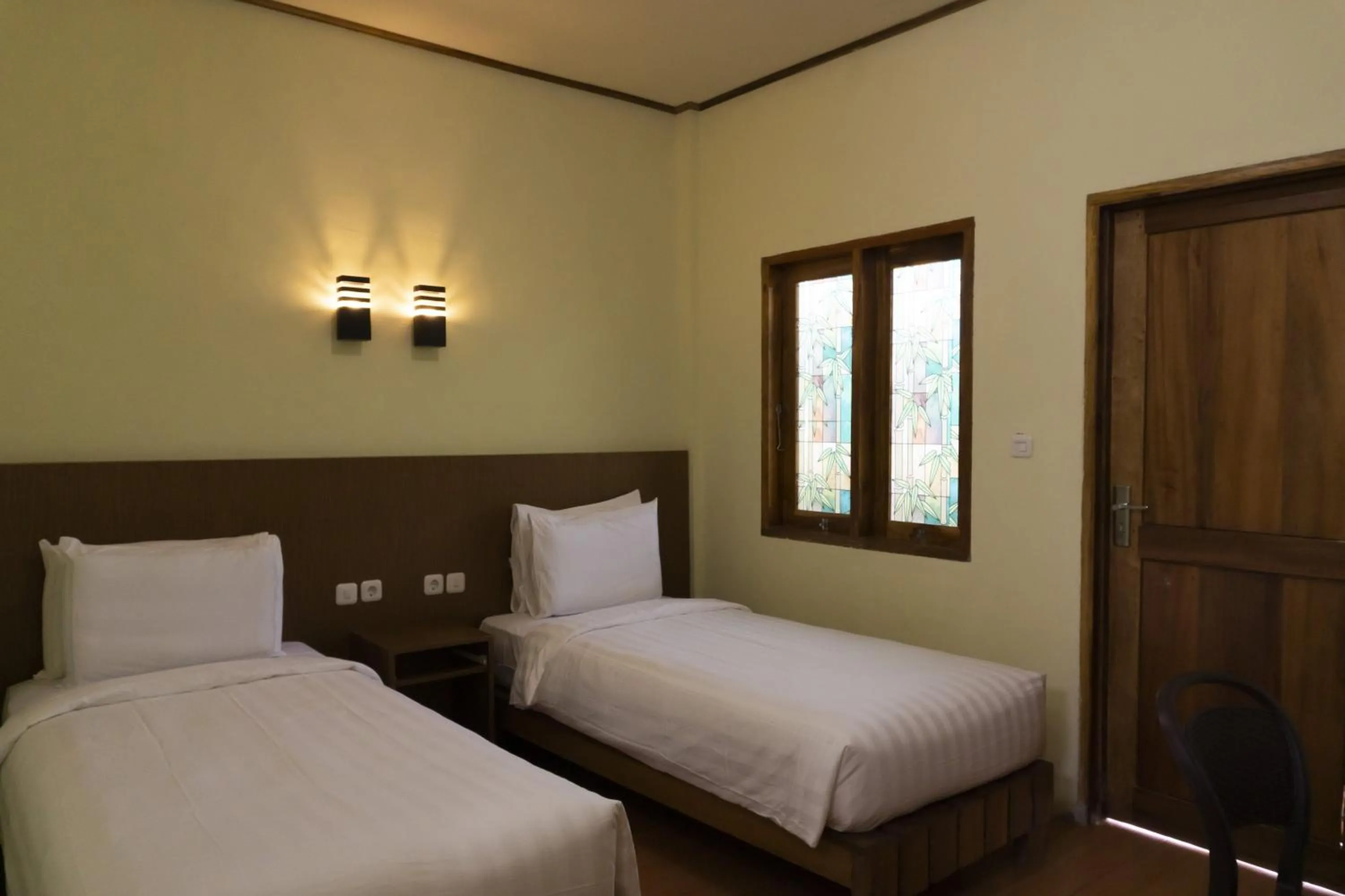 Photo of the whole room, Bed in Wah Resort Gili Trawangan