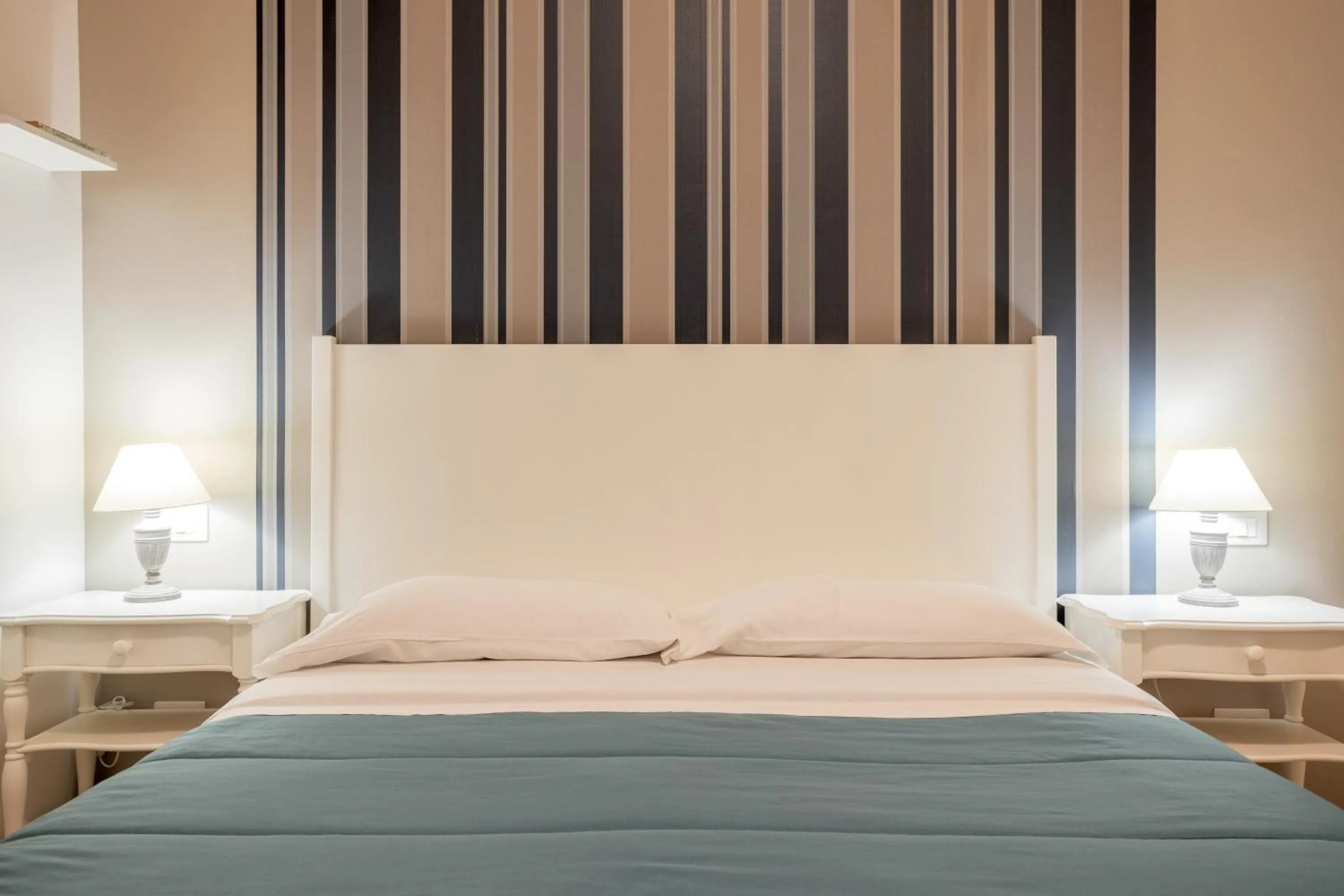 Bed in B&B Palermo Bella Rooms and Suites