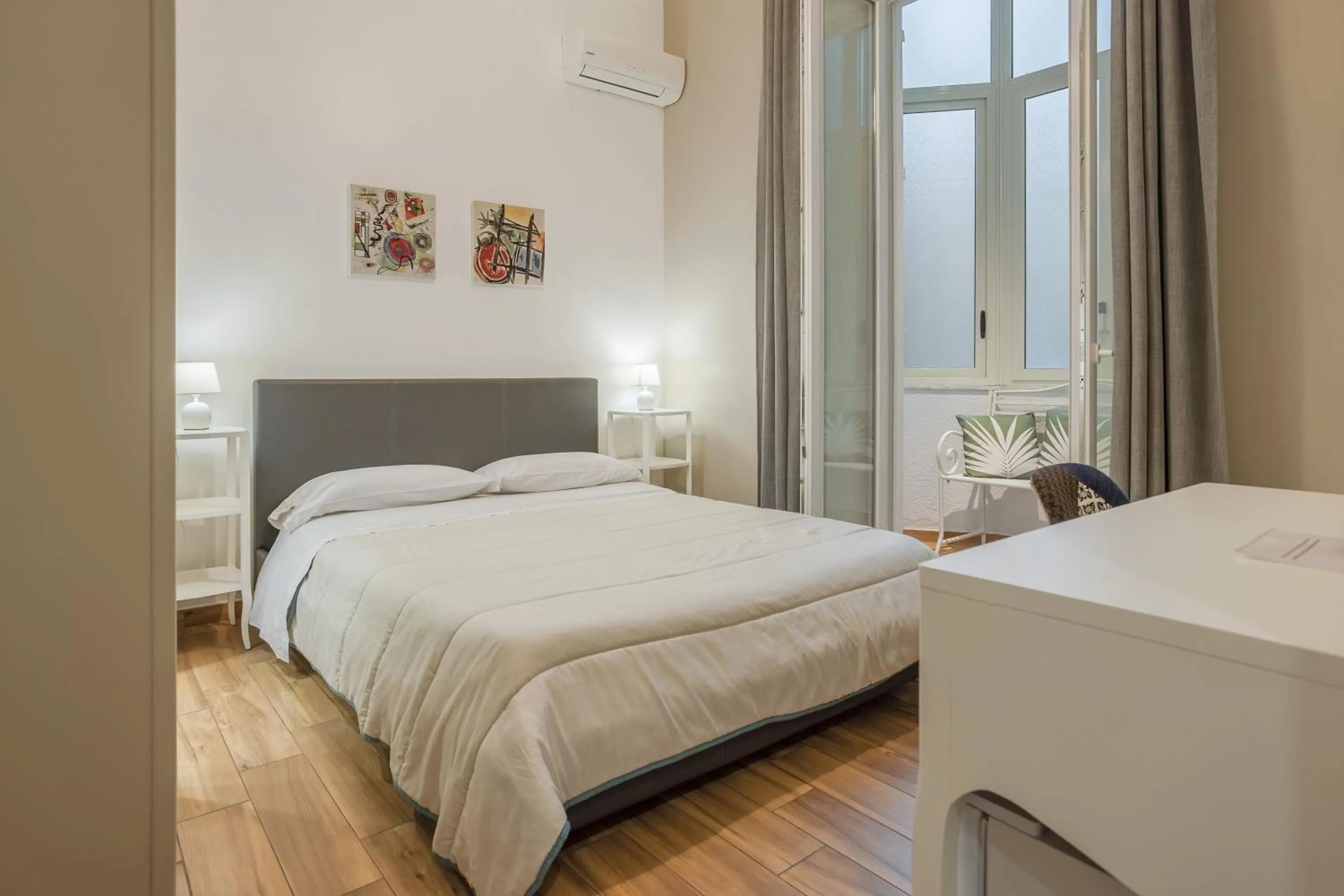 Bed in B&B Palermo Bella Rooms and Suites