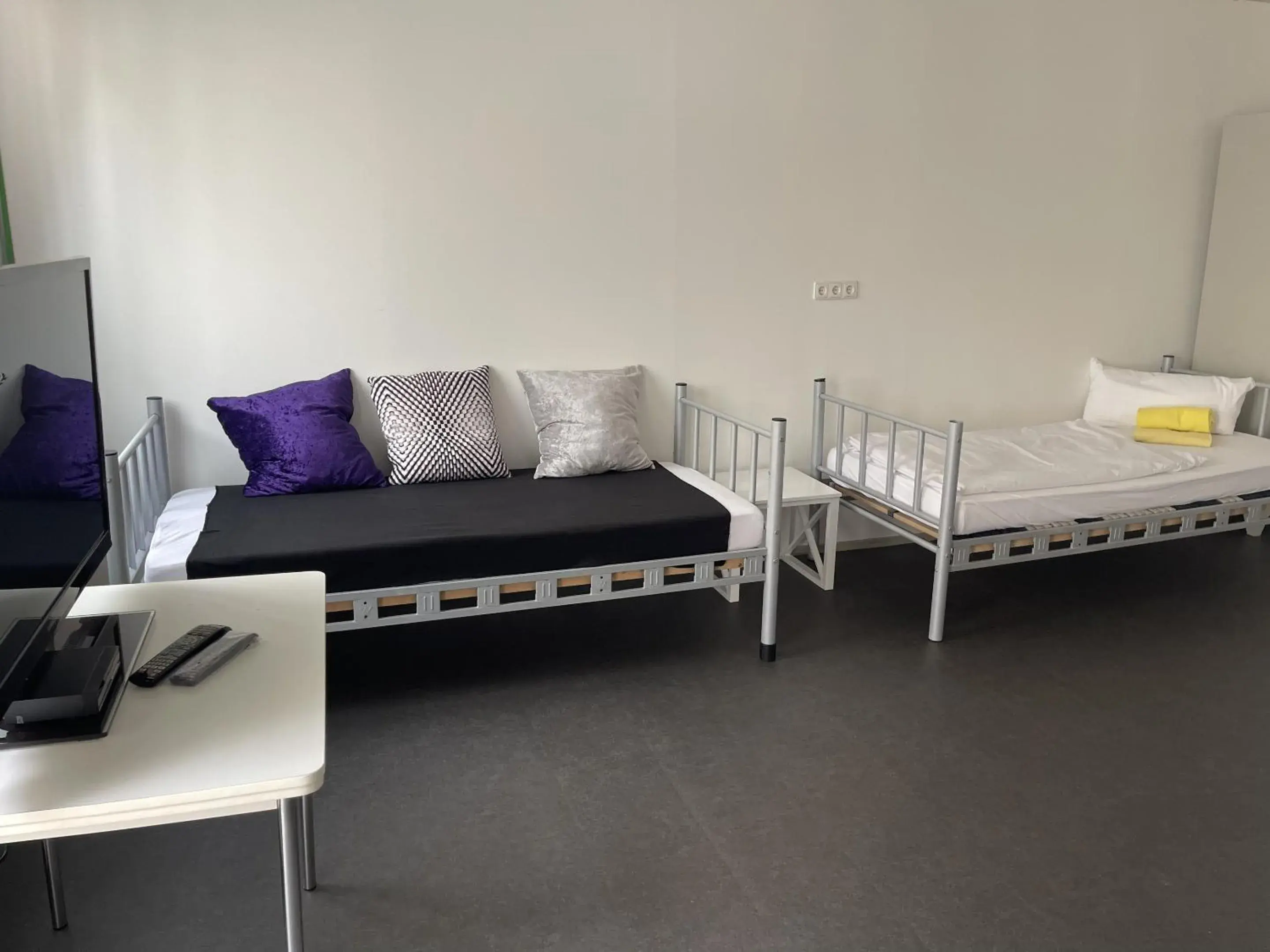 Bedroom, Seating Area in Maffei Apartments