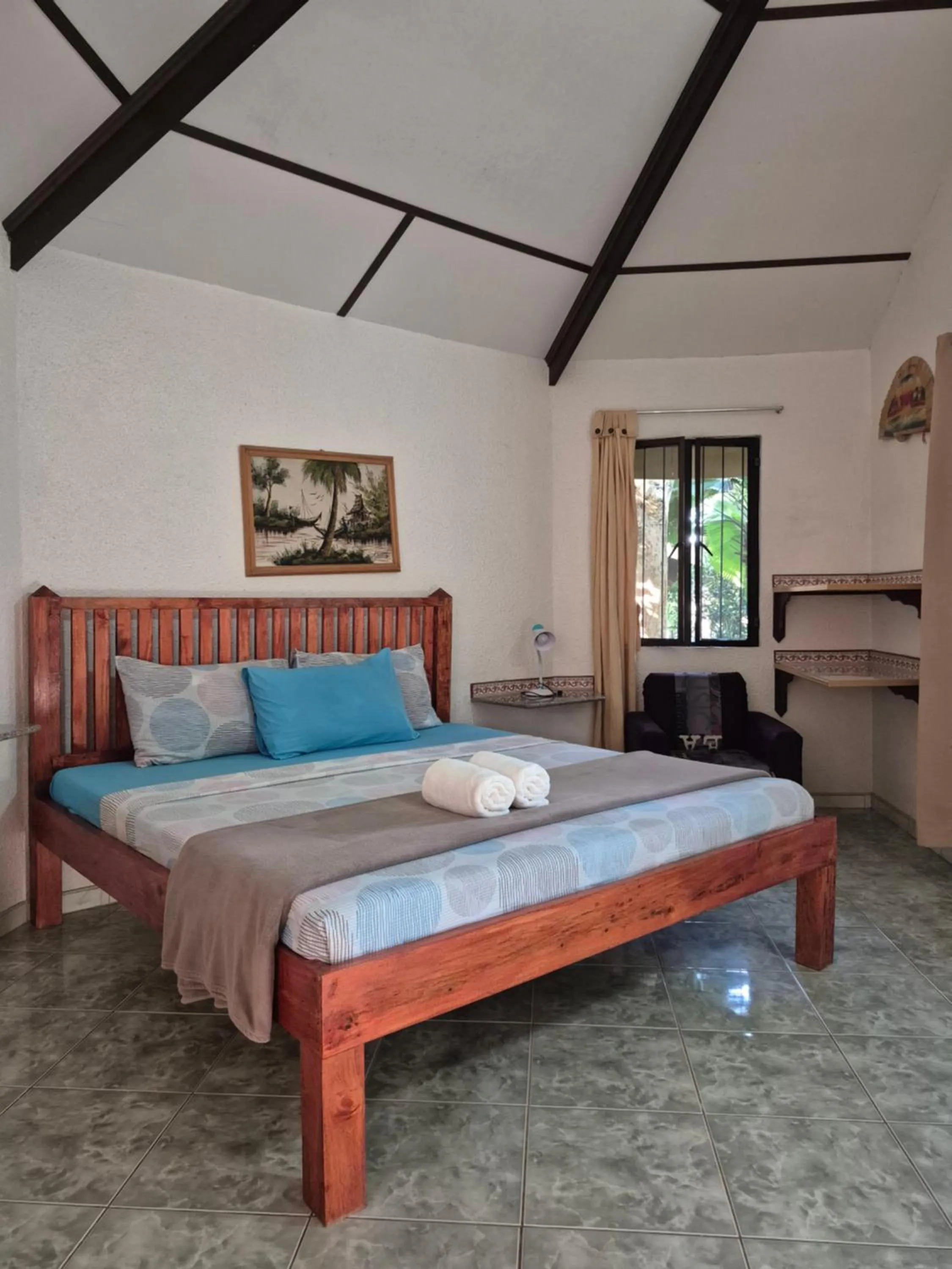 Bed in ALONALAND RESORT