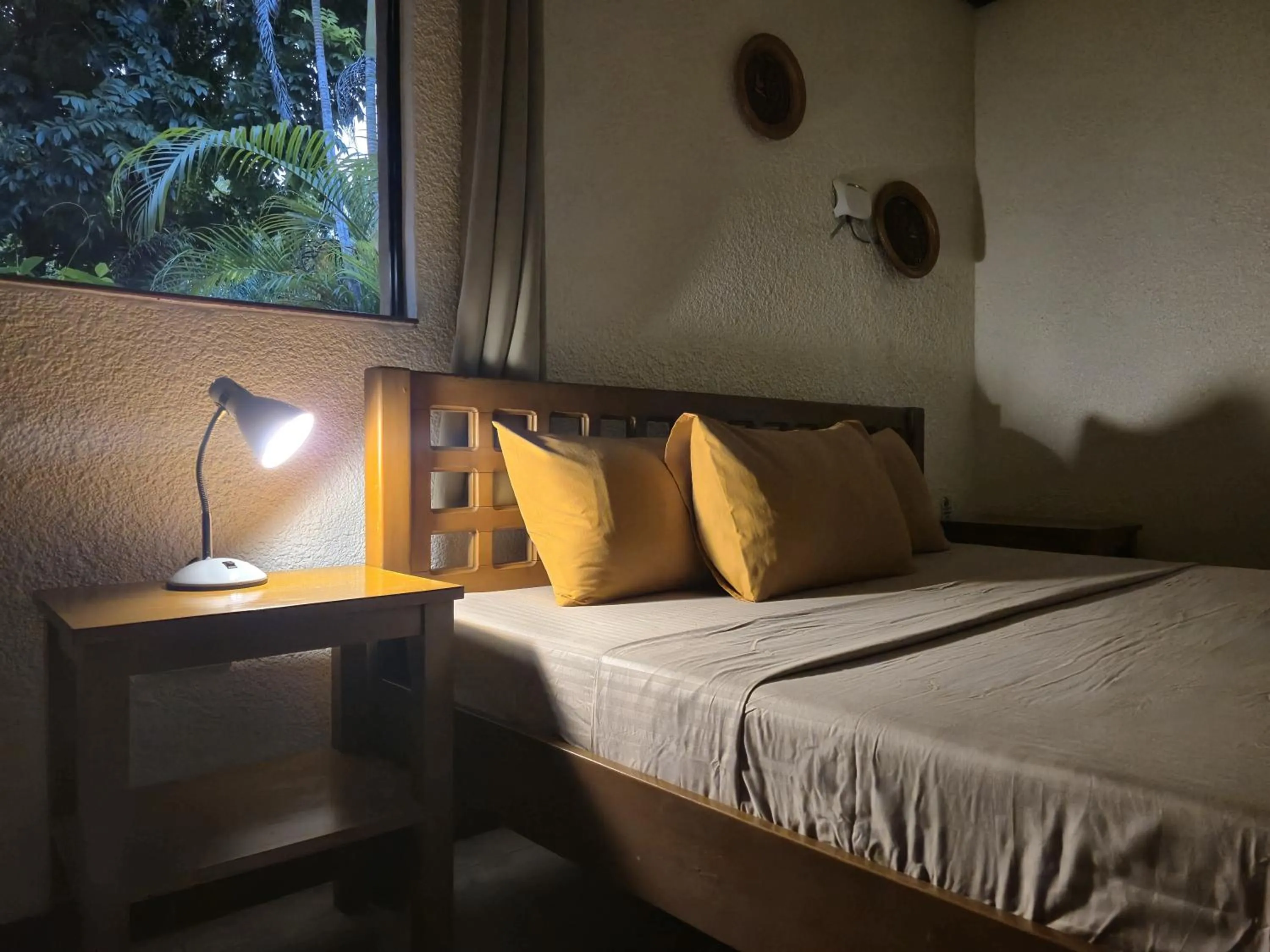 Bed in ALONALAND RESORT