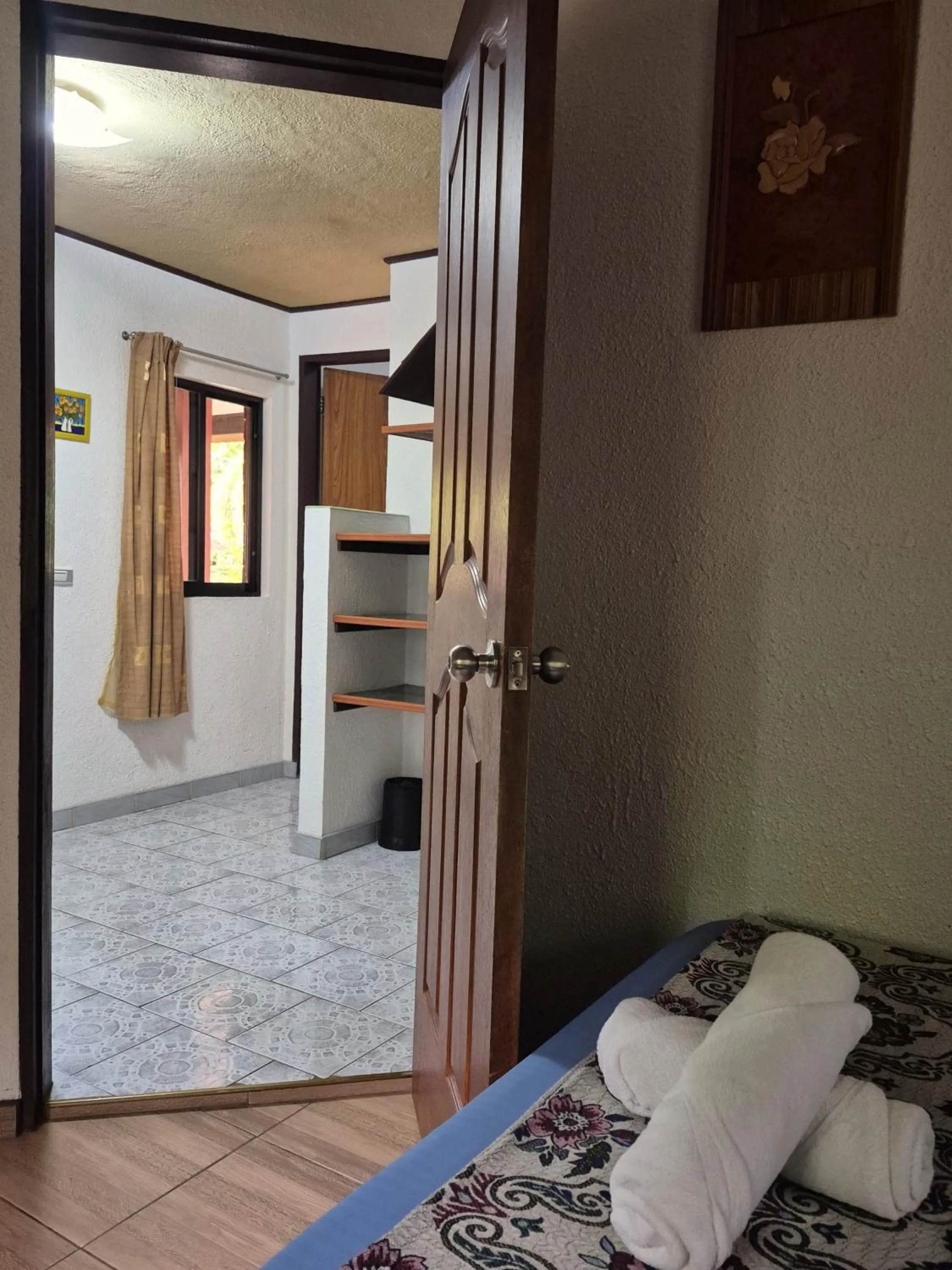 Bed in ALONALAND RESORT