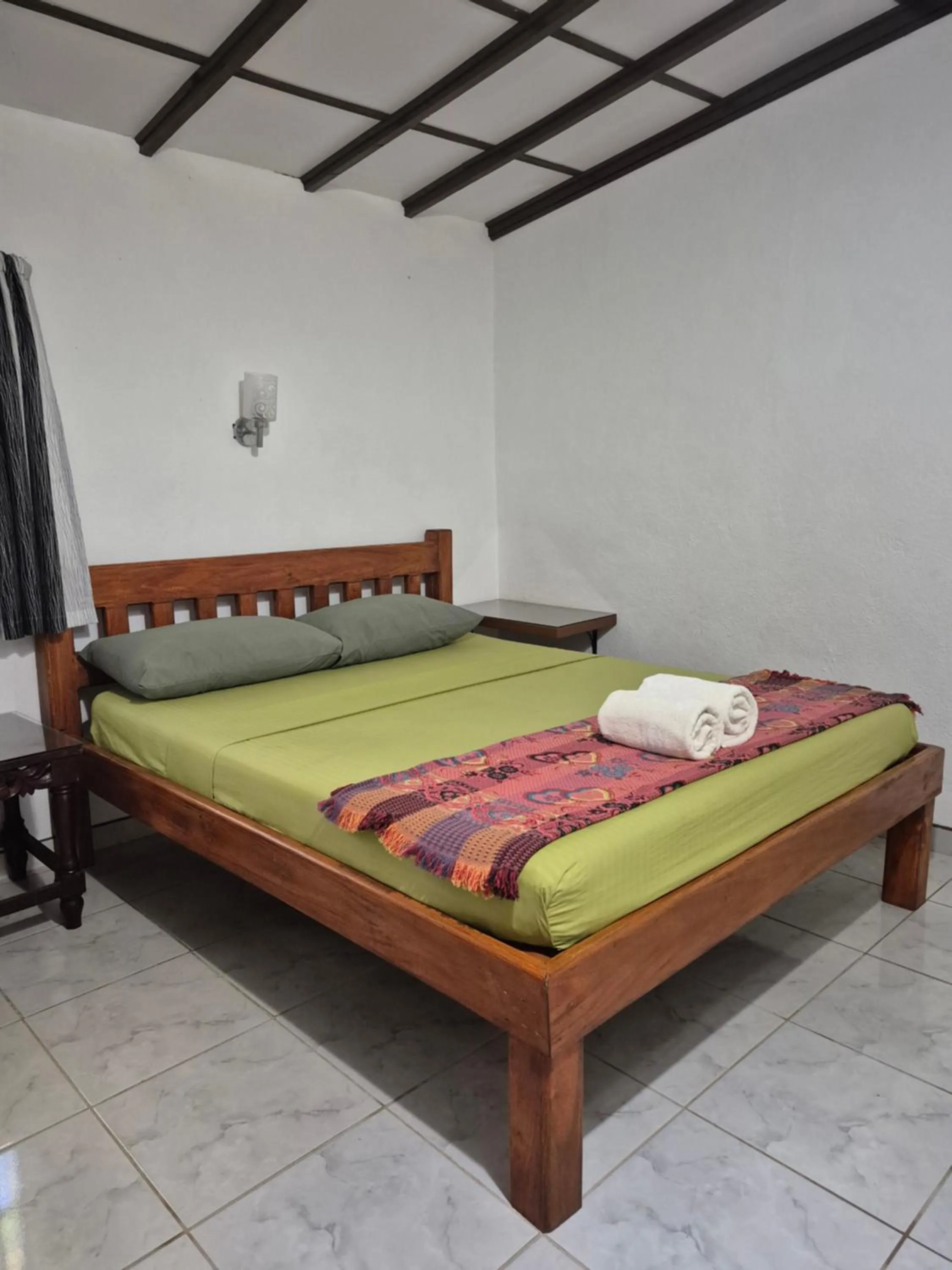 Bed in ALONALAND RESORT