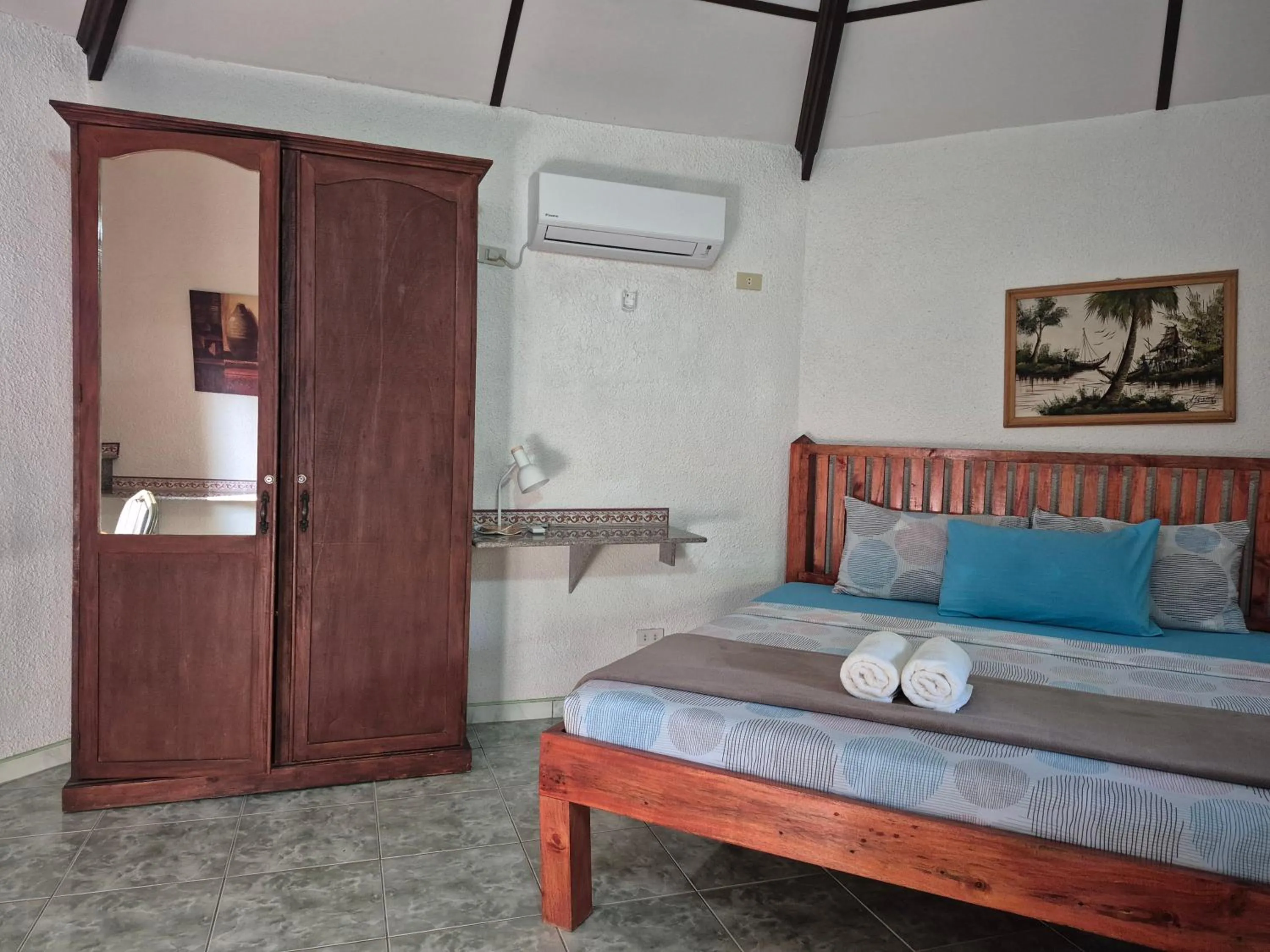 Bed in ALONALAND RESORT