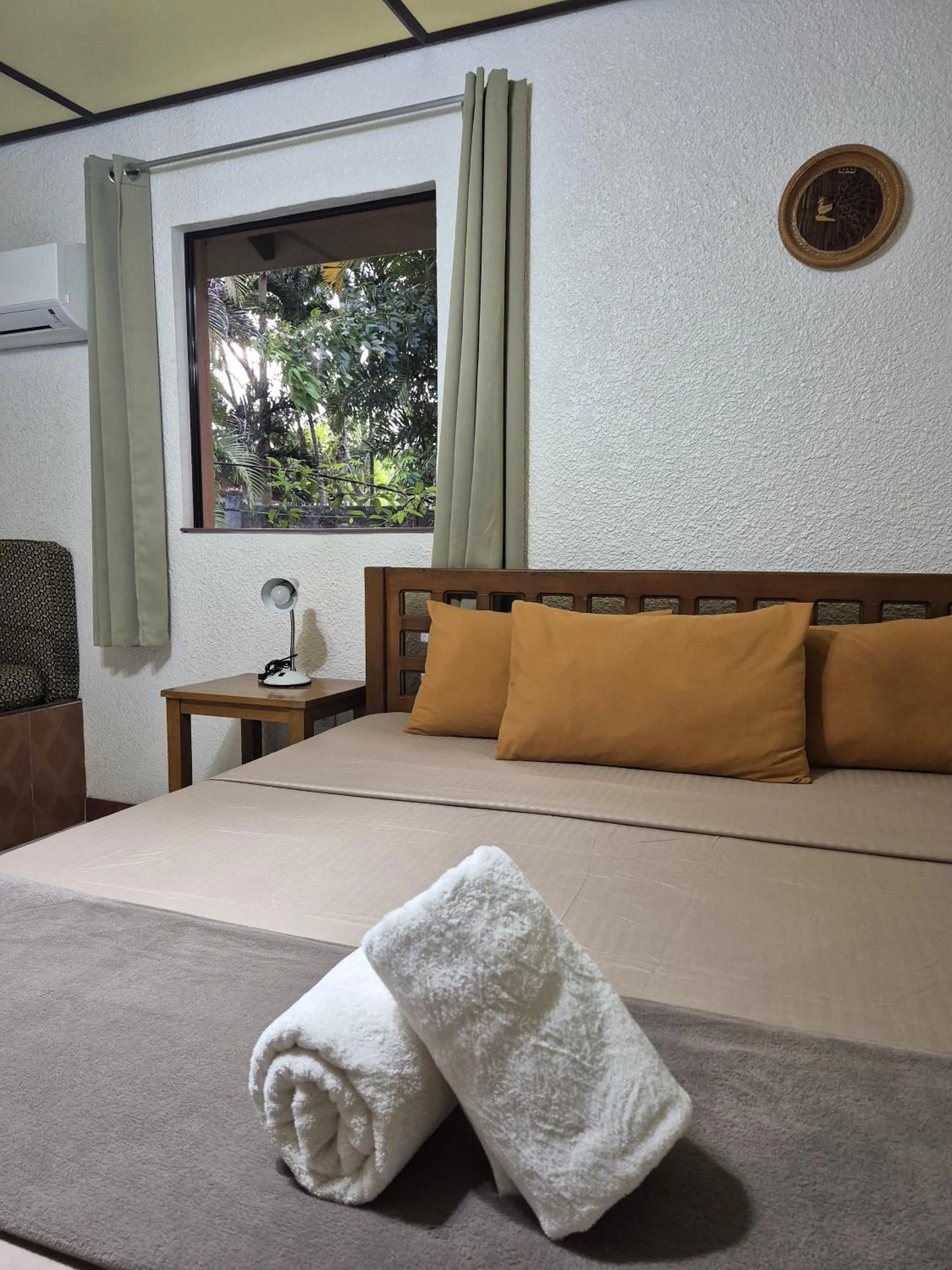 Bed in ALONALAND RESORT