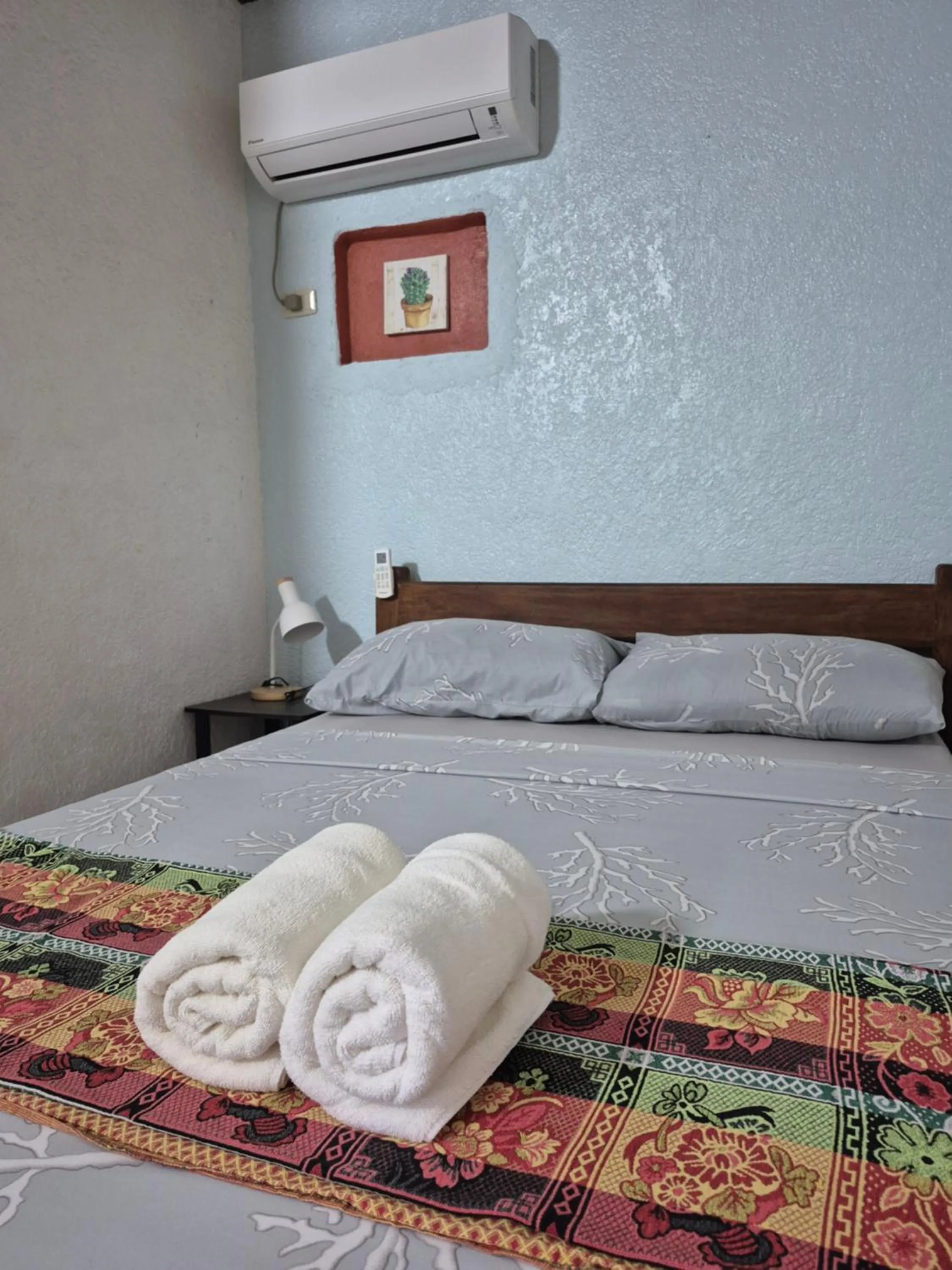 Bed in ALONALAND RESORT