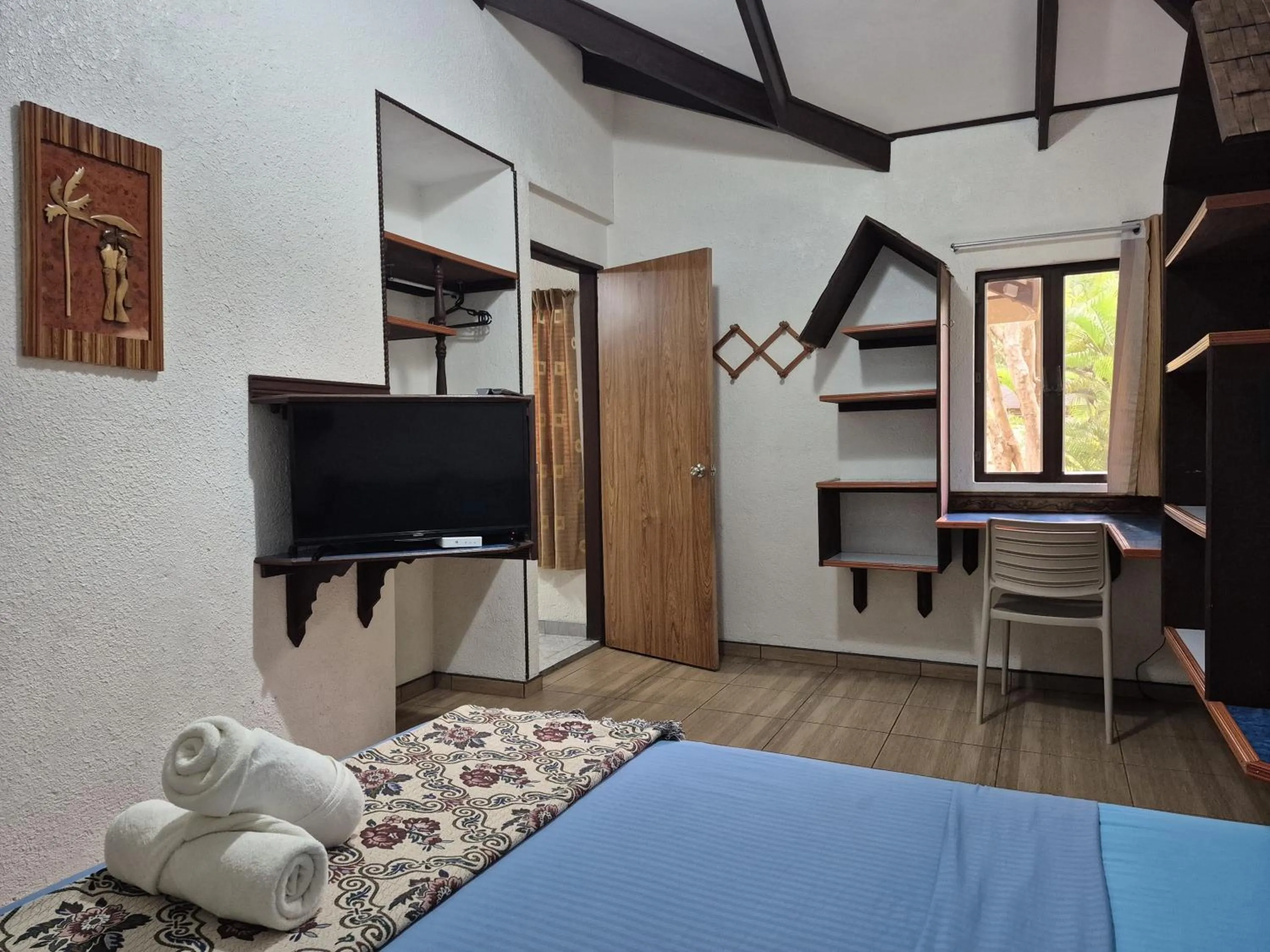 Bed in ALONALAND RESORT