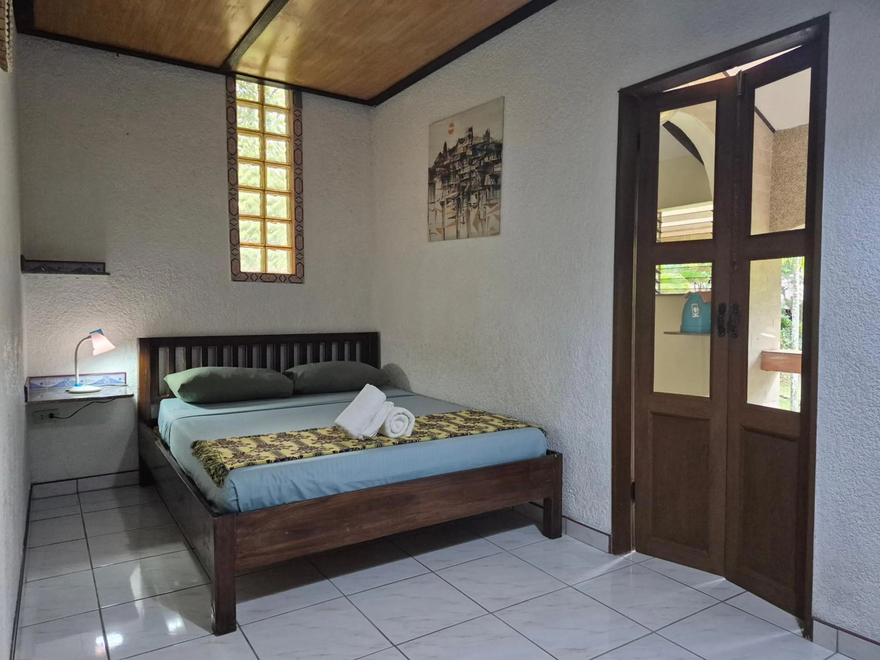 Bed in ALONALAND RESORT