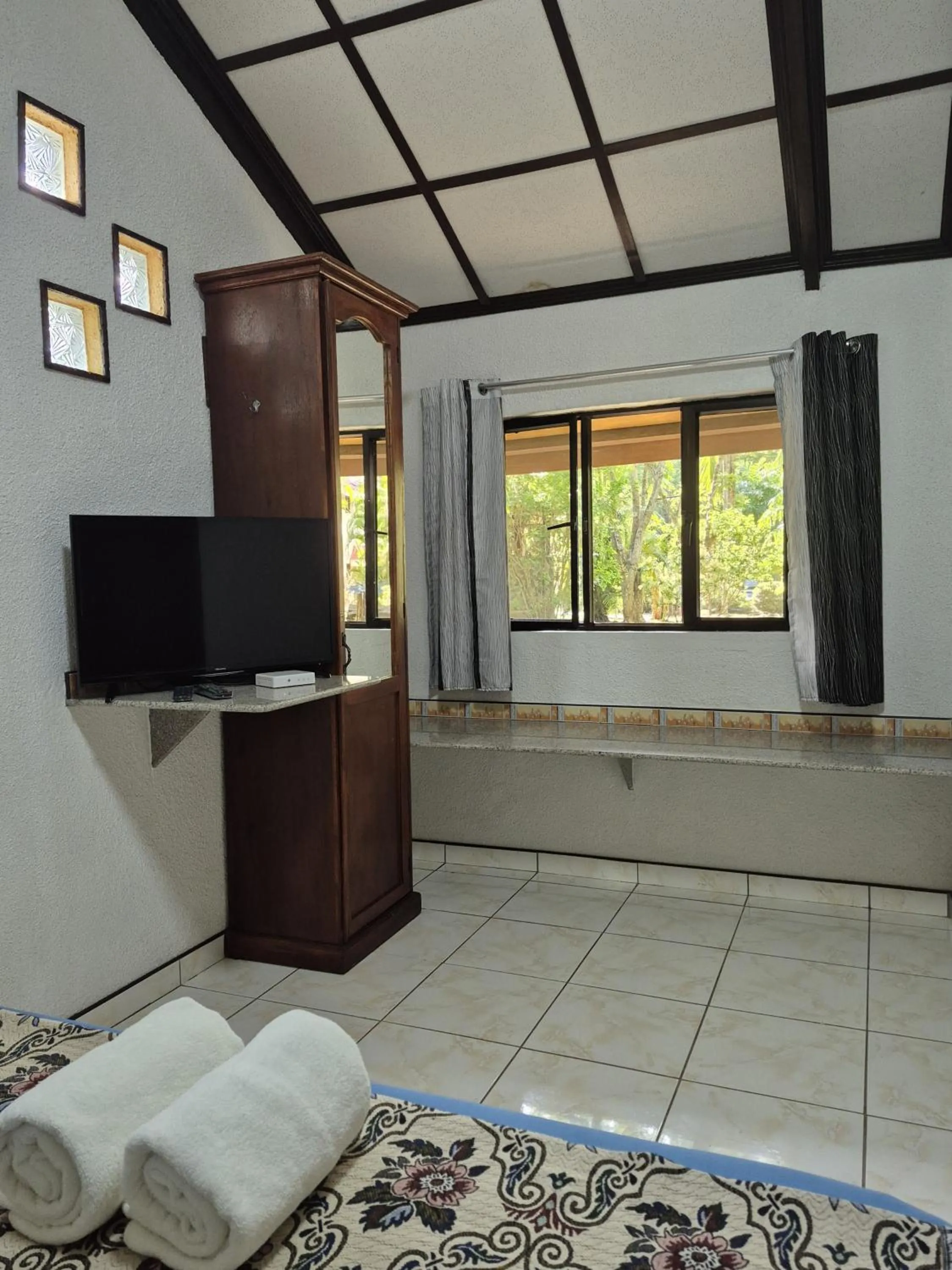 Bed in ALONALAND RESORT