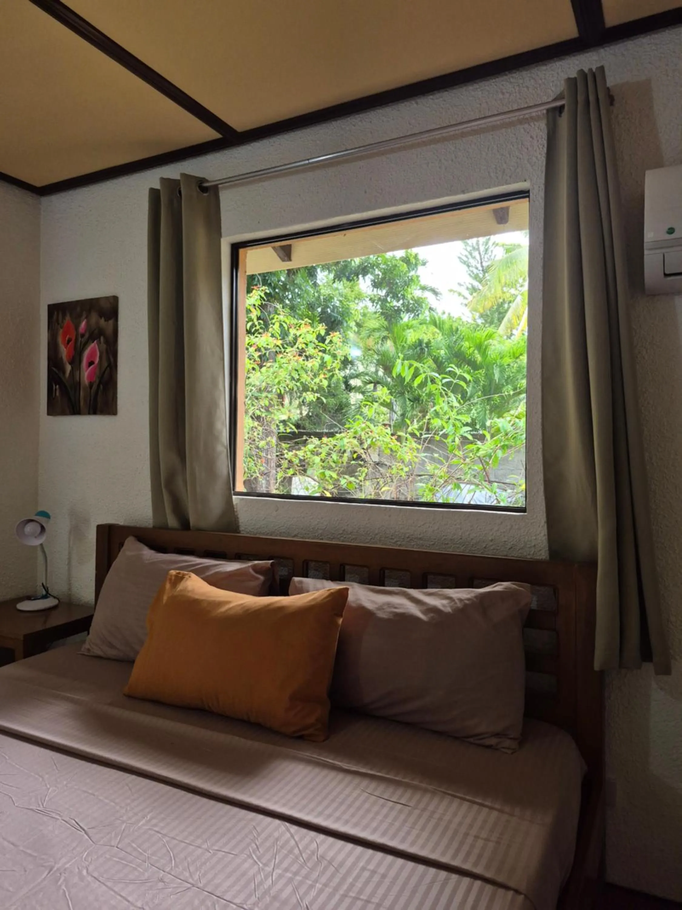 Bed in ALONALAND RESORT