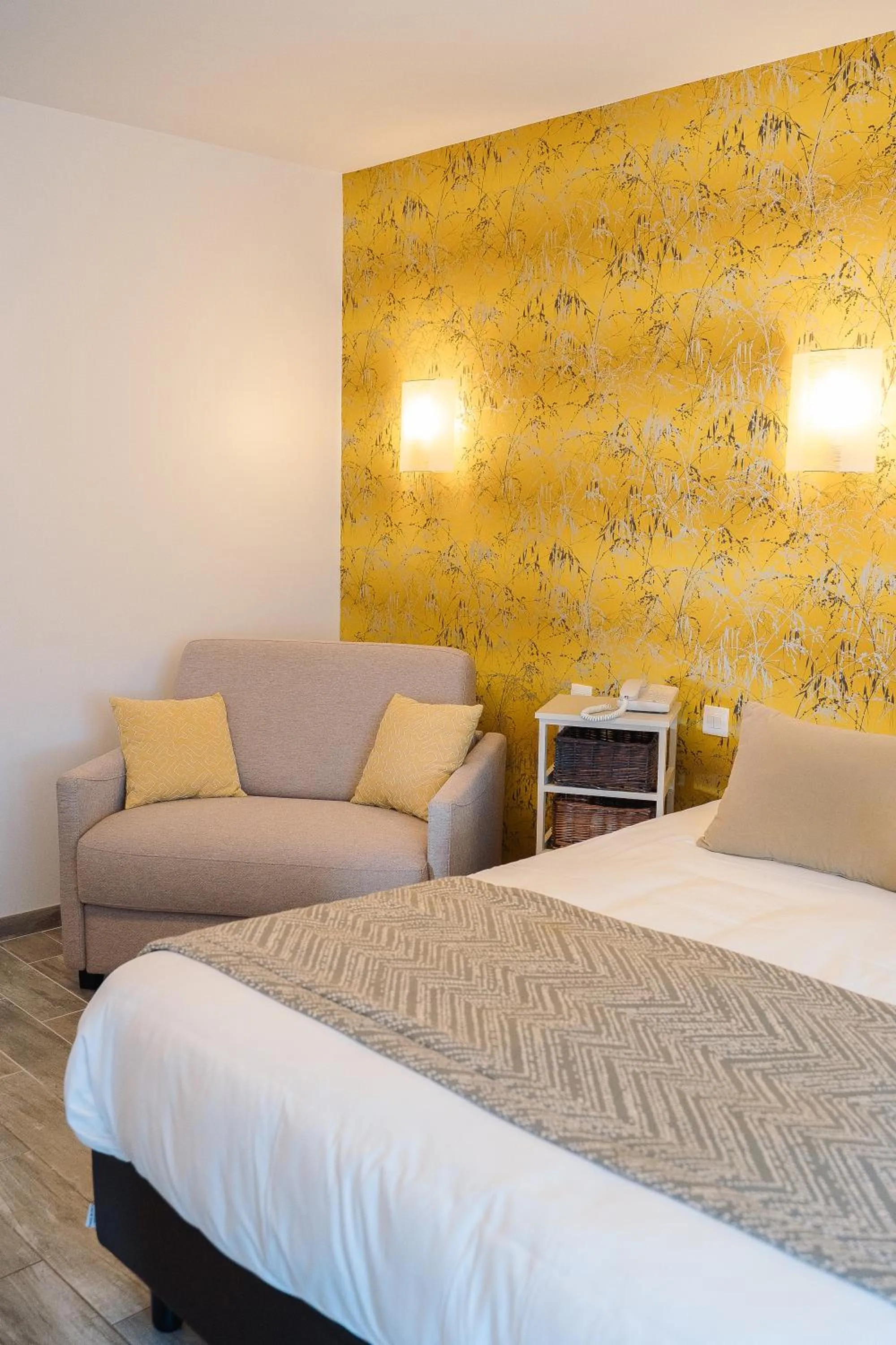 Bed in Hôtel Les Agapanthes-Logis Hôtel