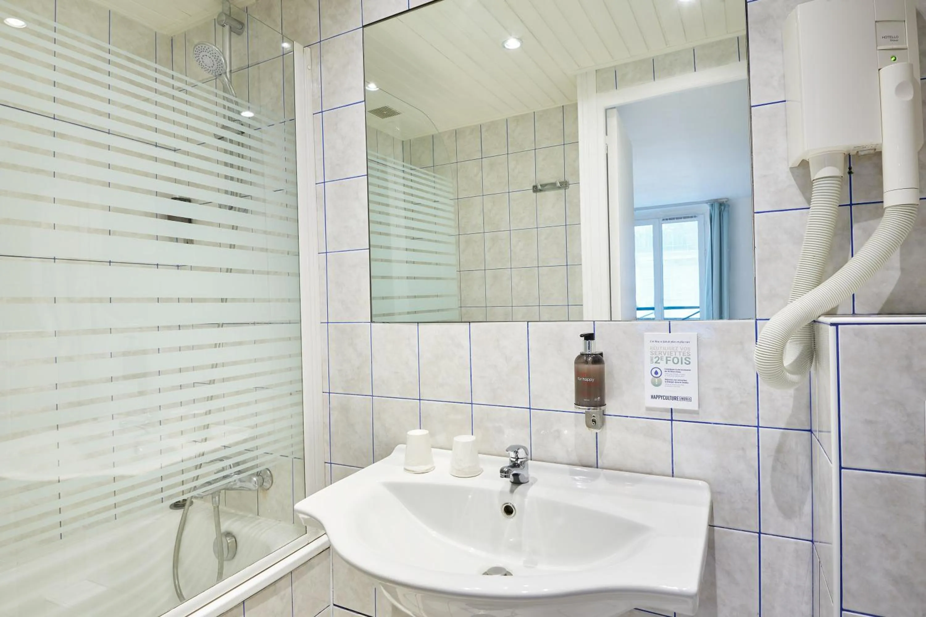 Bathroom in Hôtel Kabanel by Happyculture