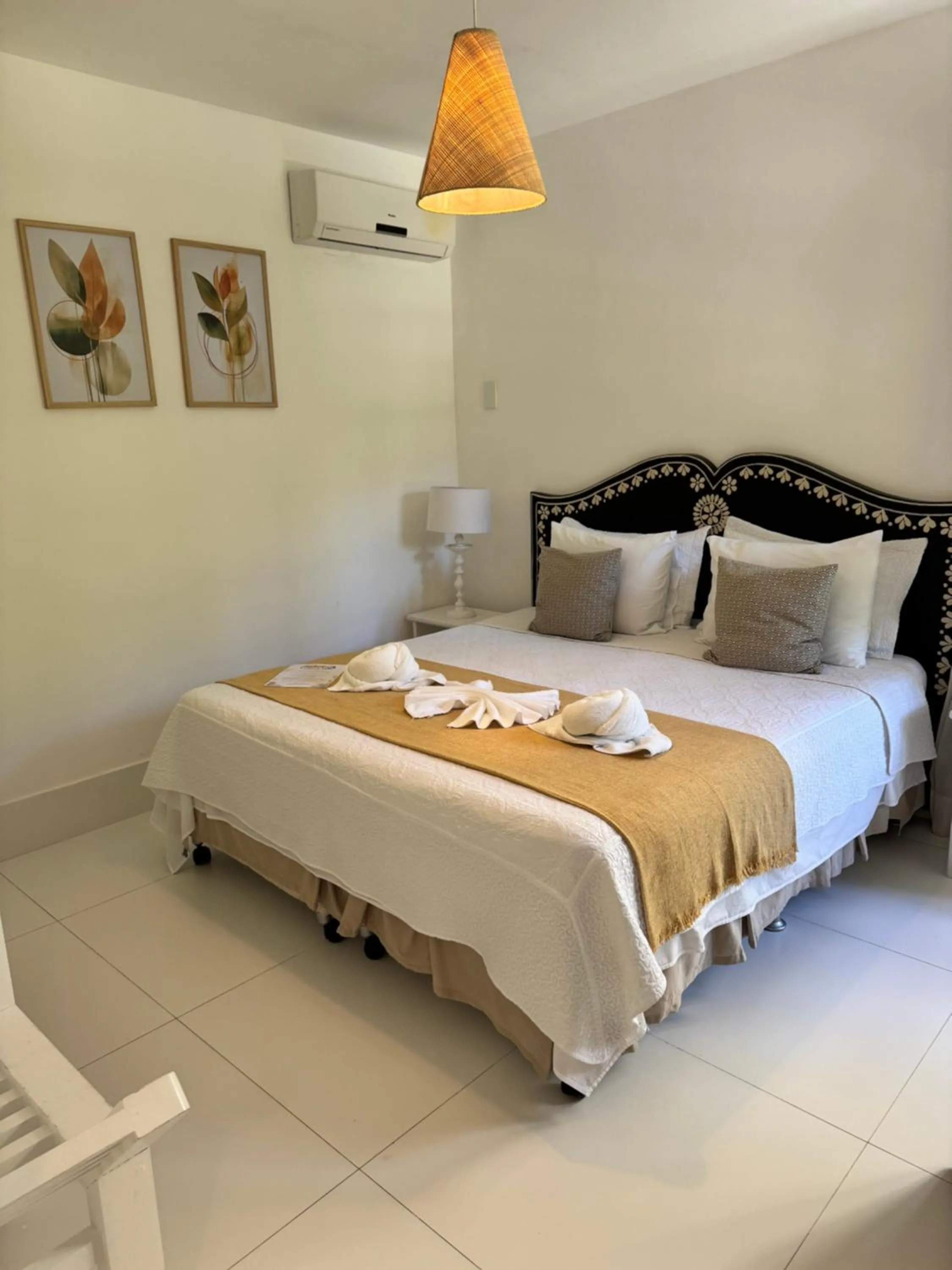 Bed in Pousada Coisa e Tao