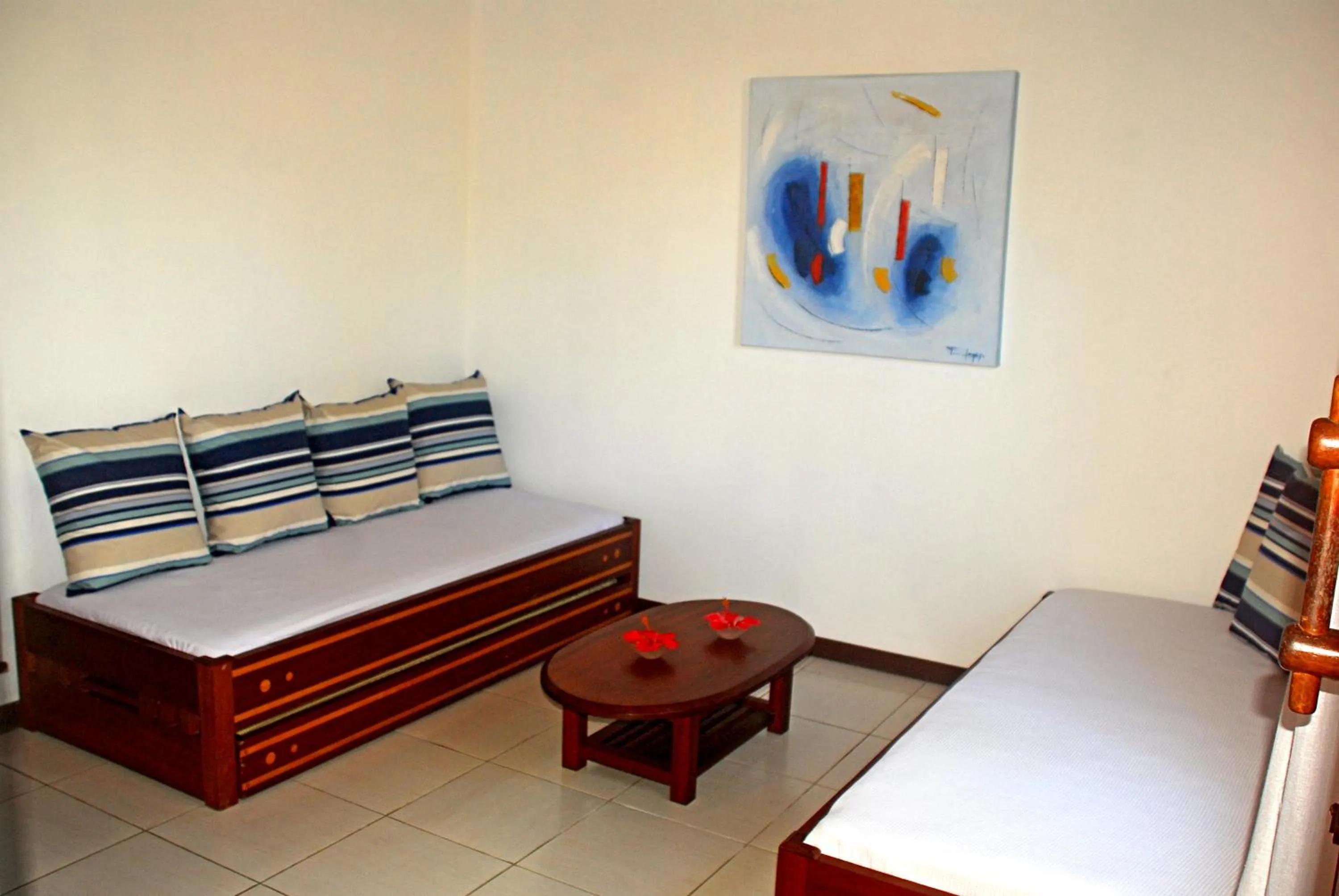 Living room, Bed in Pousada Coisa e Tao