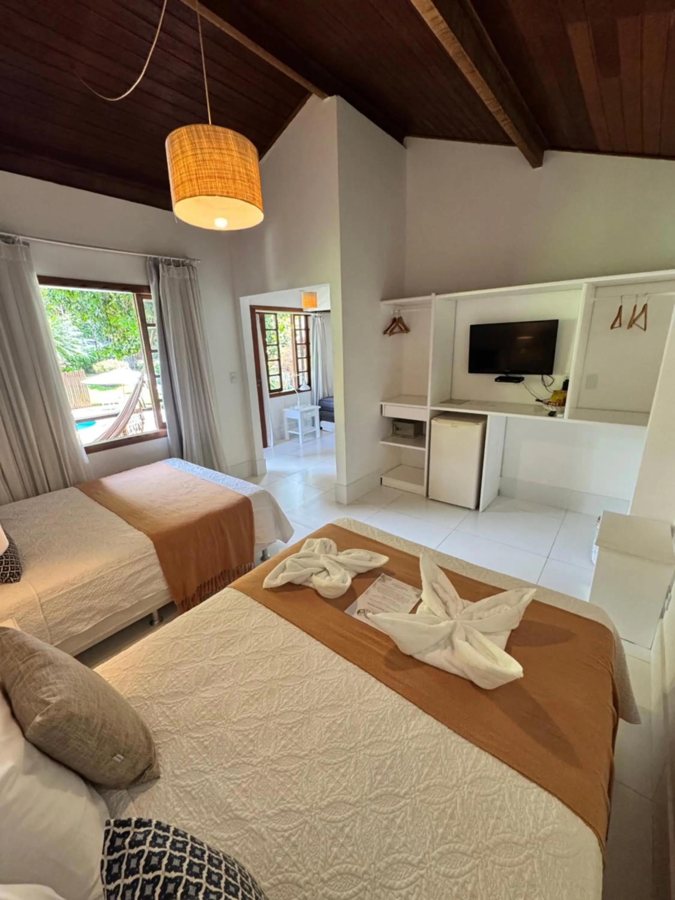 Bed in Pousada Coisa e Tao
