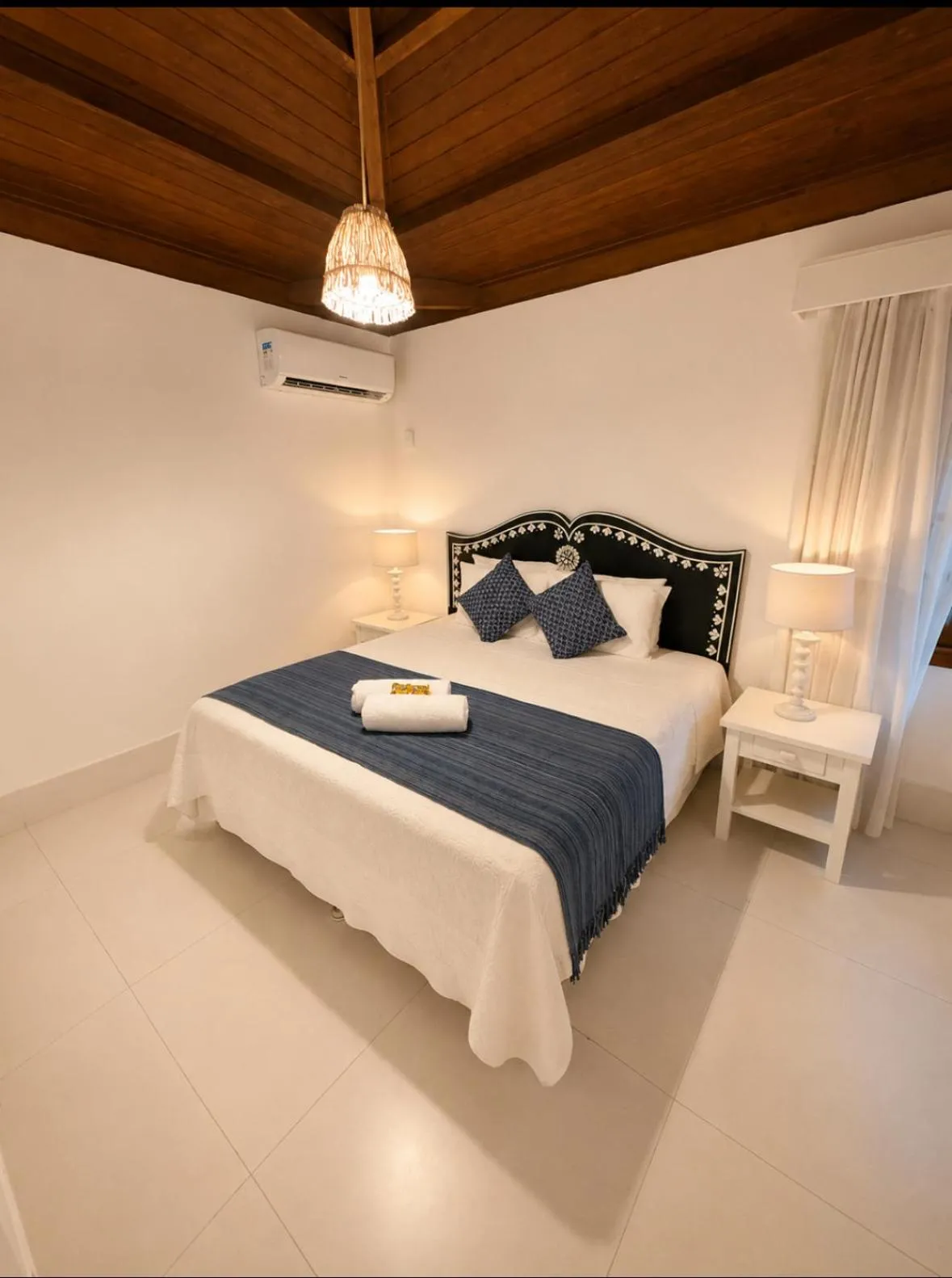Bed in Pousada Coisa e Tao