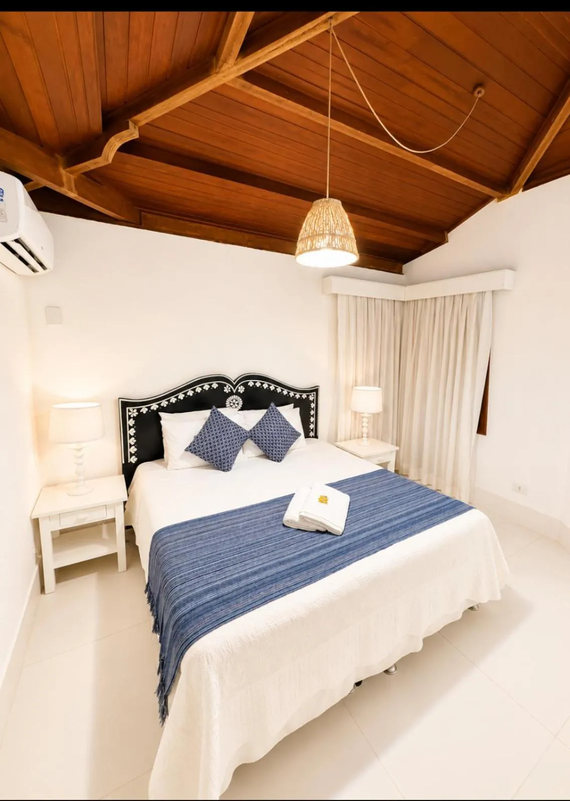Bed in Pousada Coisa e Tao