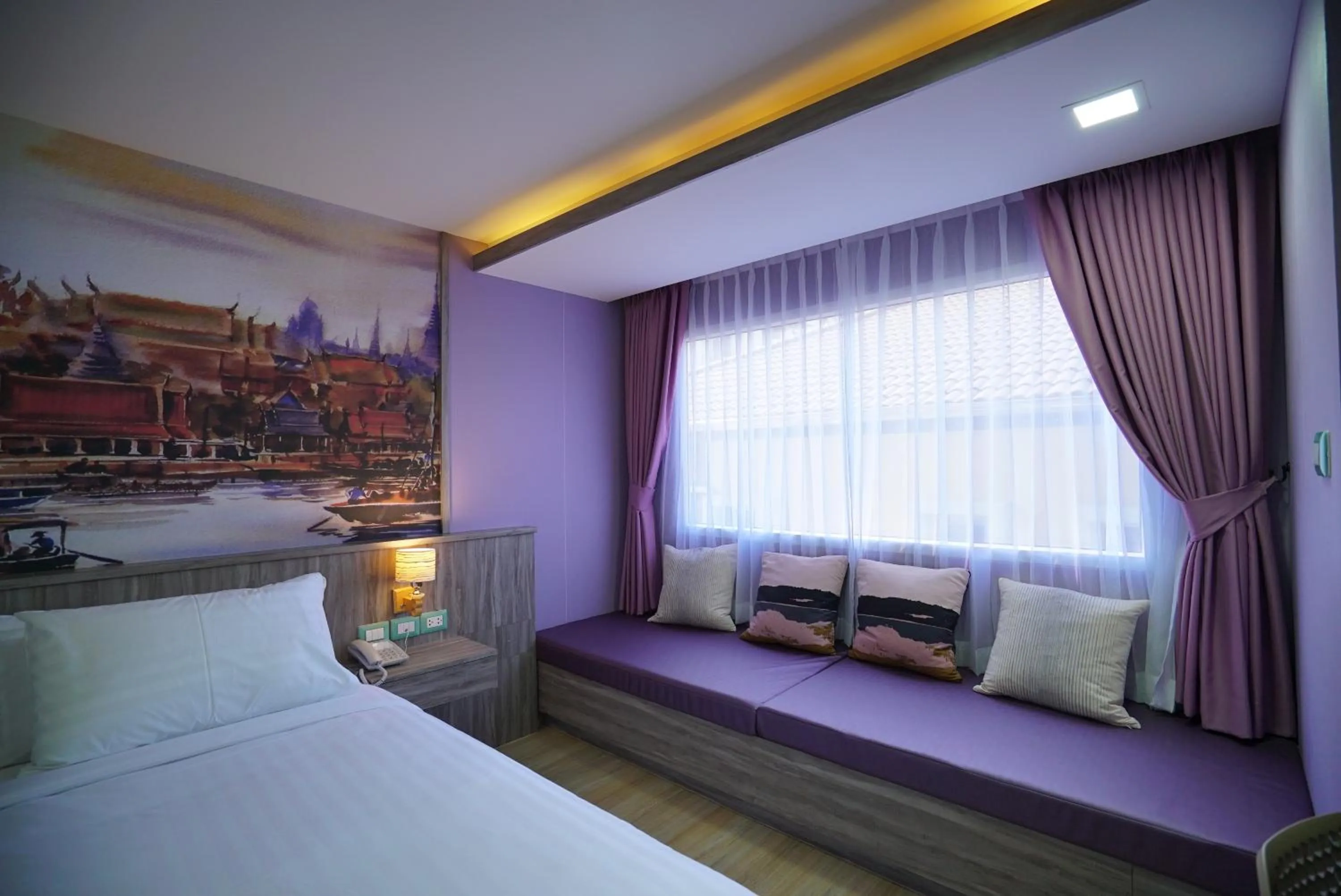 Seating area, Bed in The Qube fifty Hotel