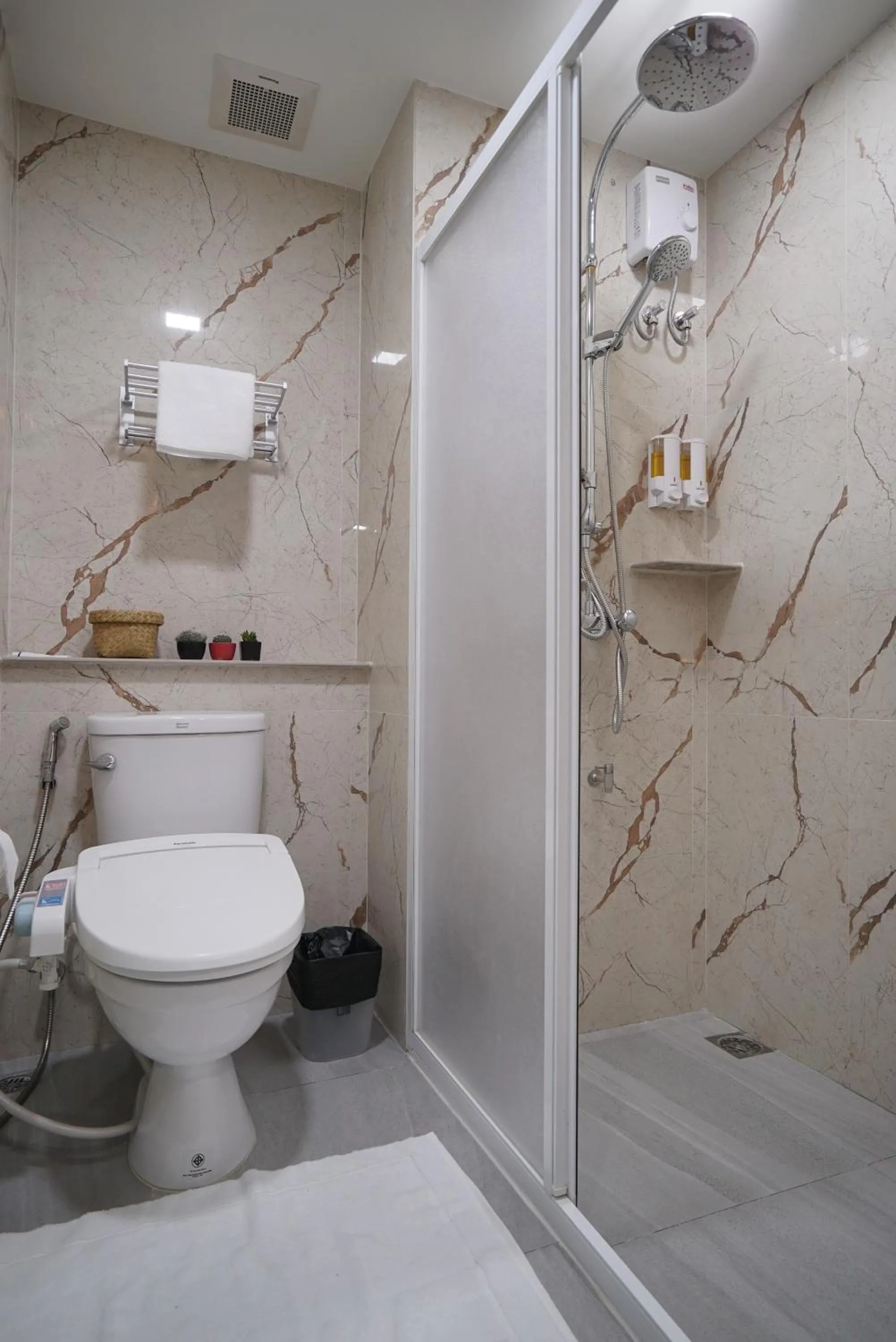 Bathroom in The Qube fifty Hotel