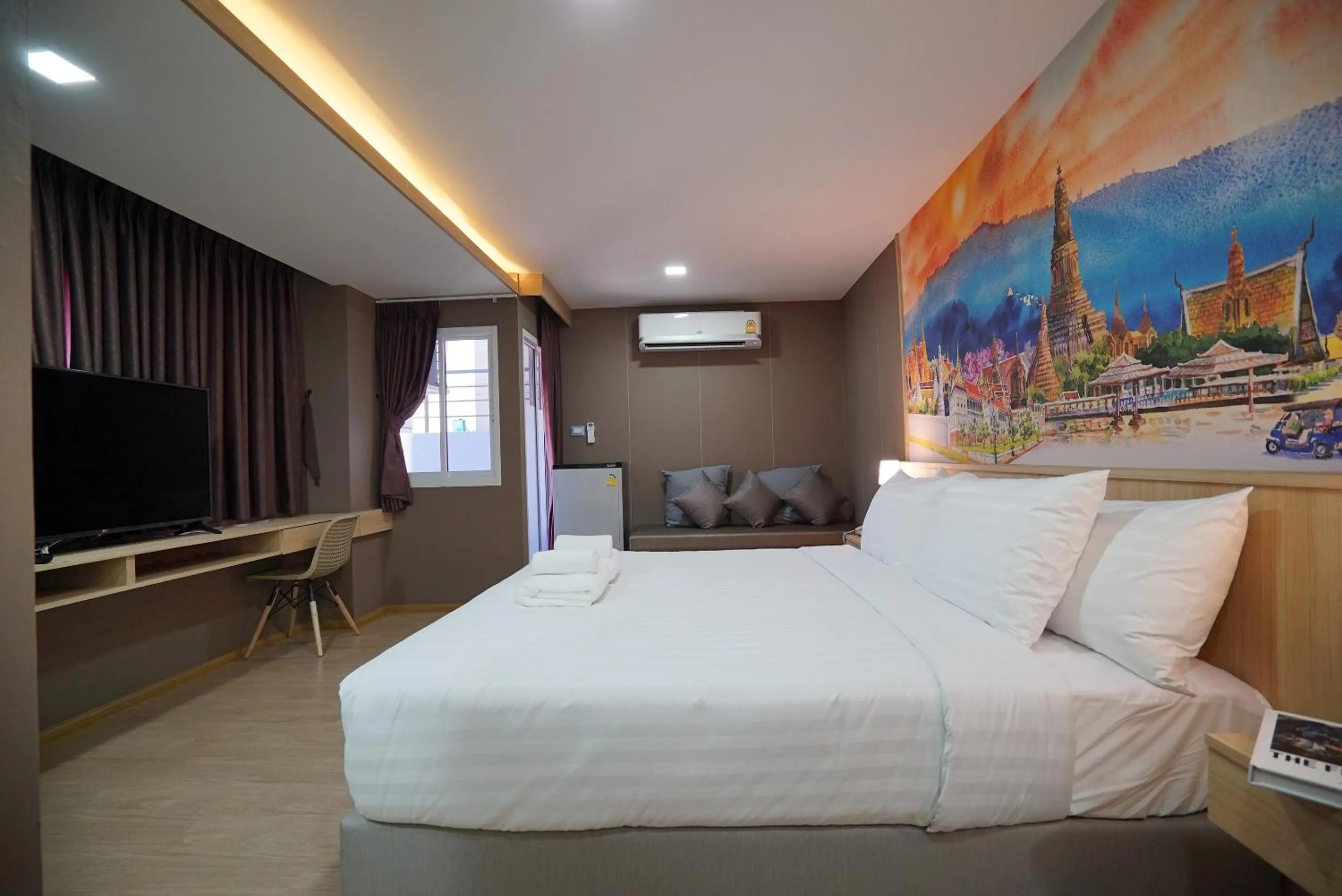 Bed in The Qube fifty Hotel