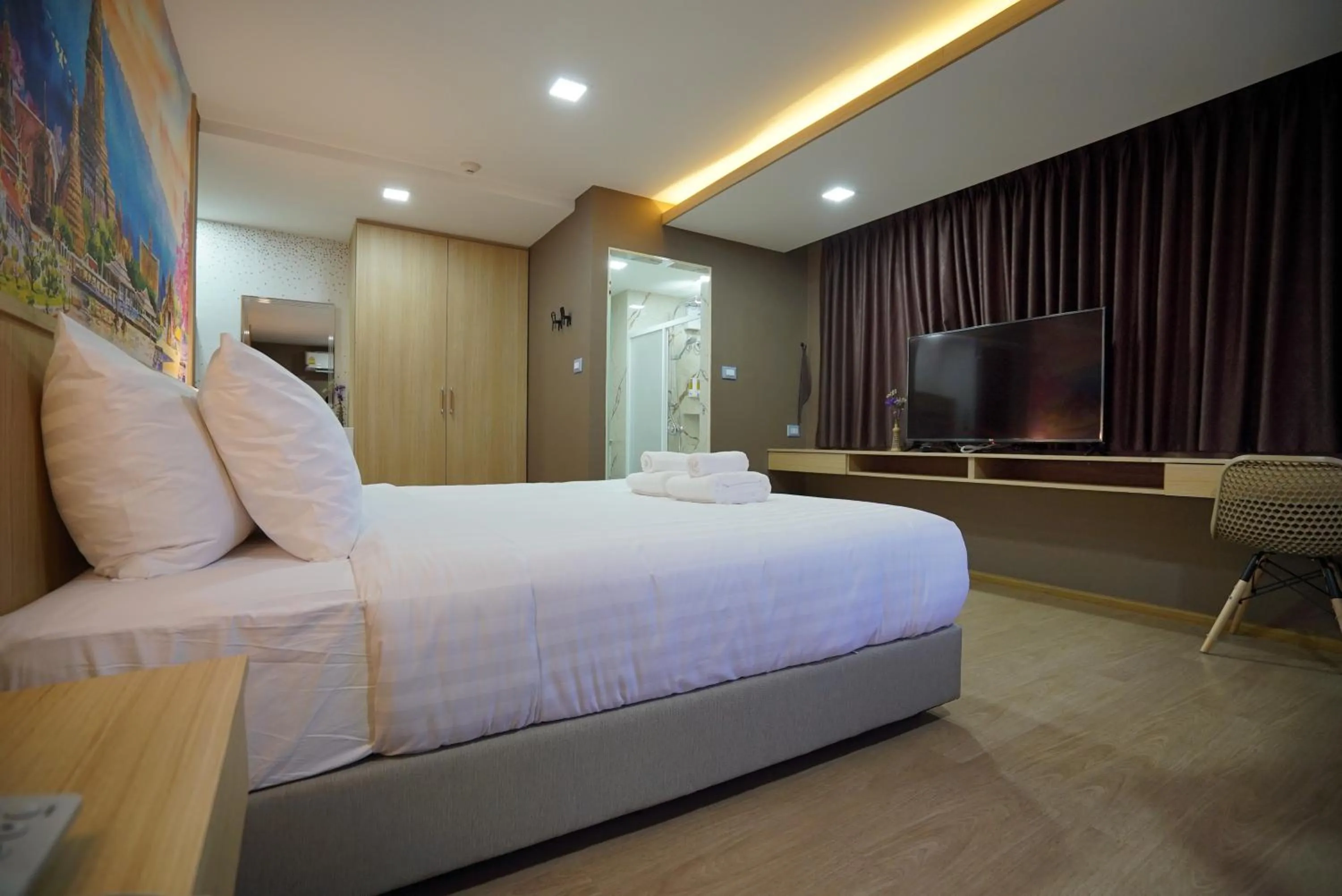 Bed in The Qube fifty Hotel