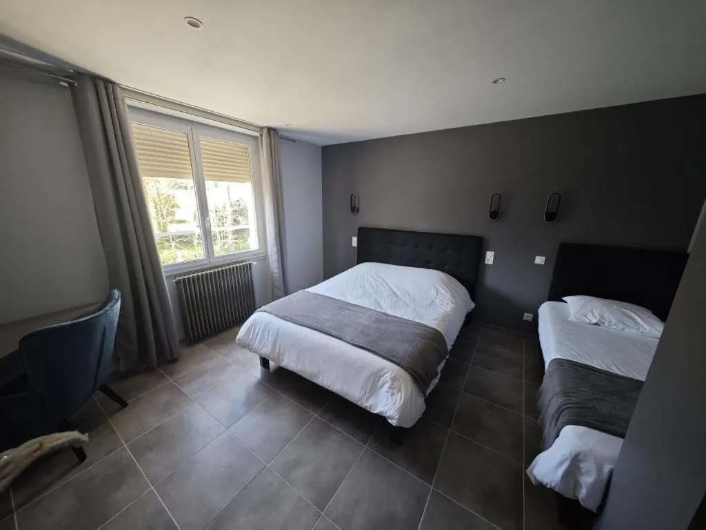 Bed in Hôtel La Renaissance