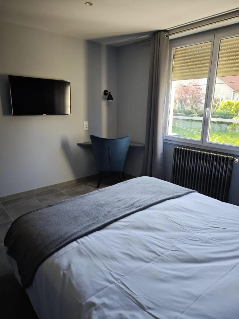 Bed in Hôtel La Renaissance