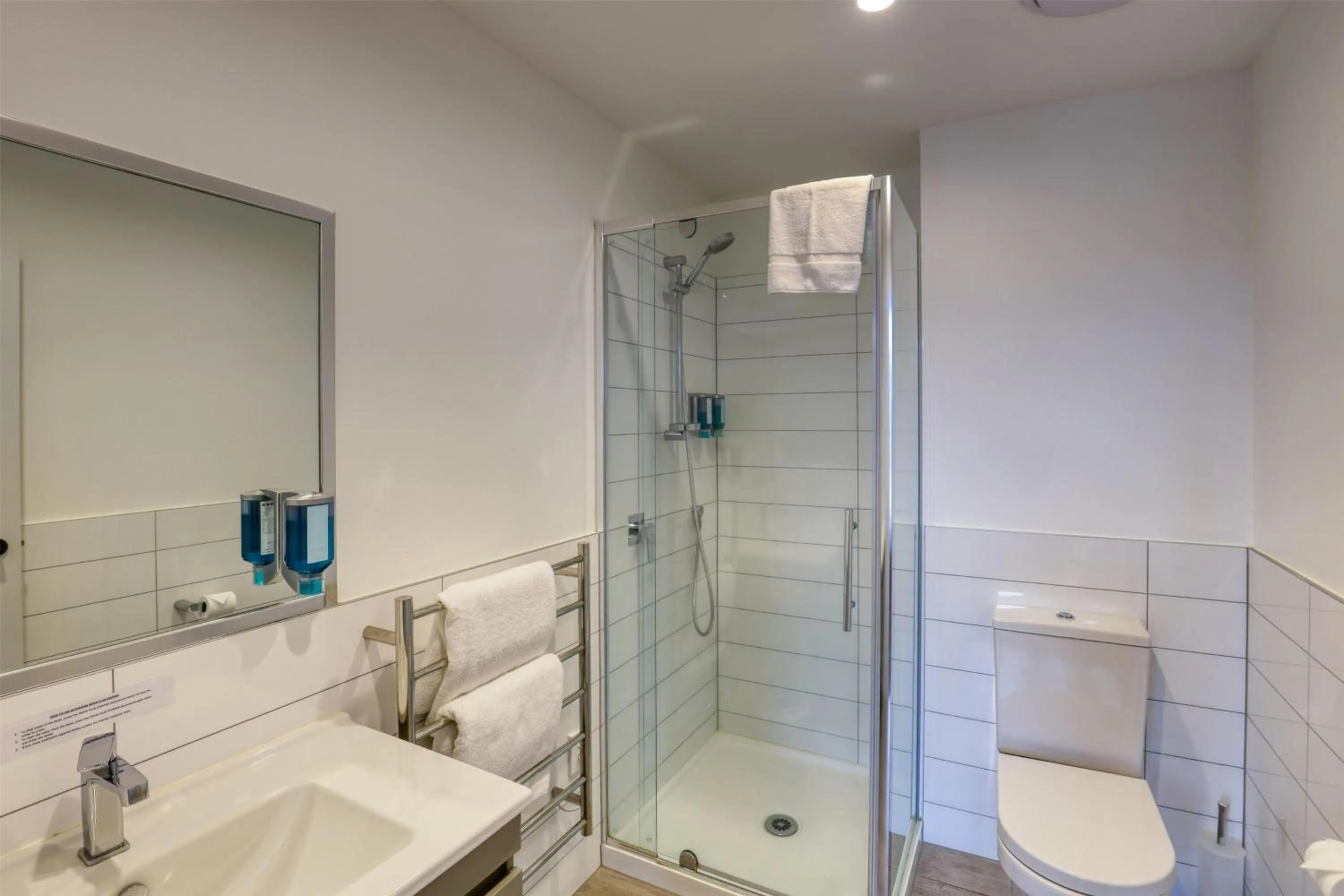 Bathroom in Ramada Suites By Wyndham Victoria Street West