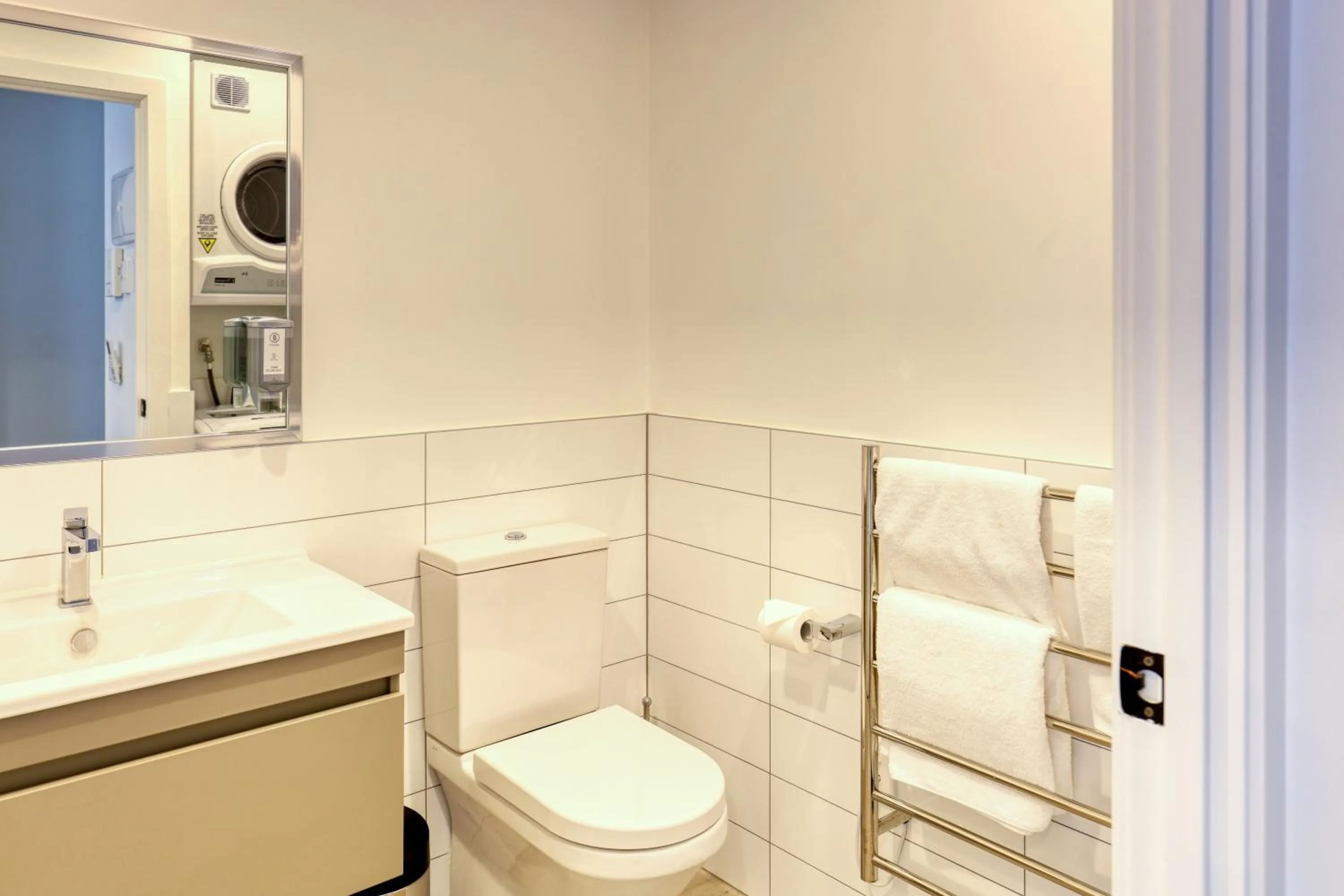 Bathroom in Ramada Suites By Wyndham Victoria Street West