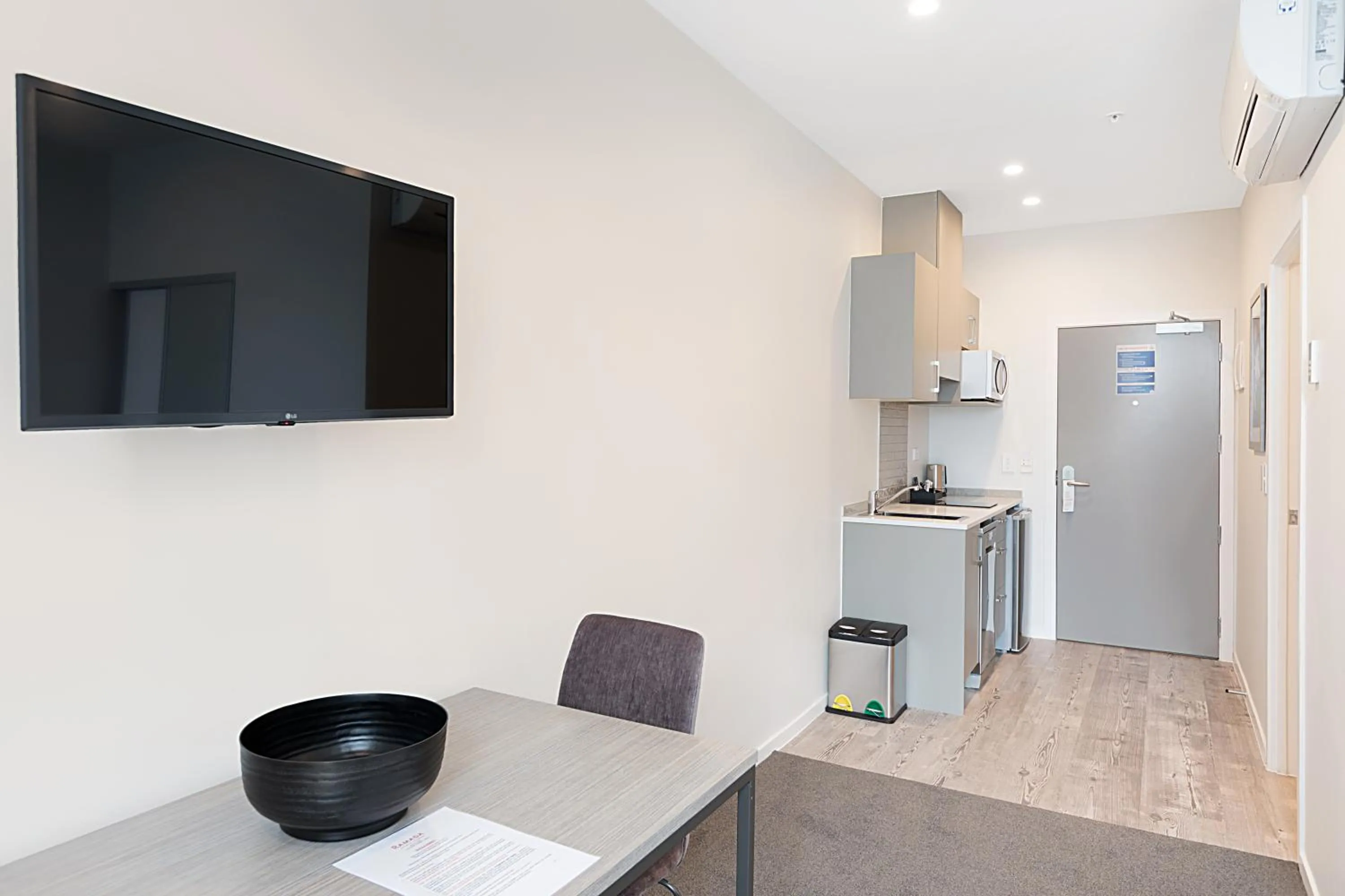 Kitchen or kitchenette in Ramada Suites By Wyndham Victoria Street West